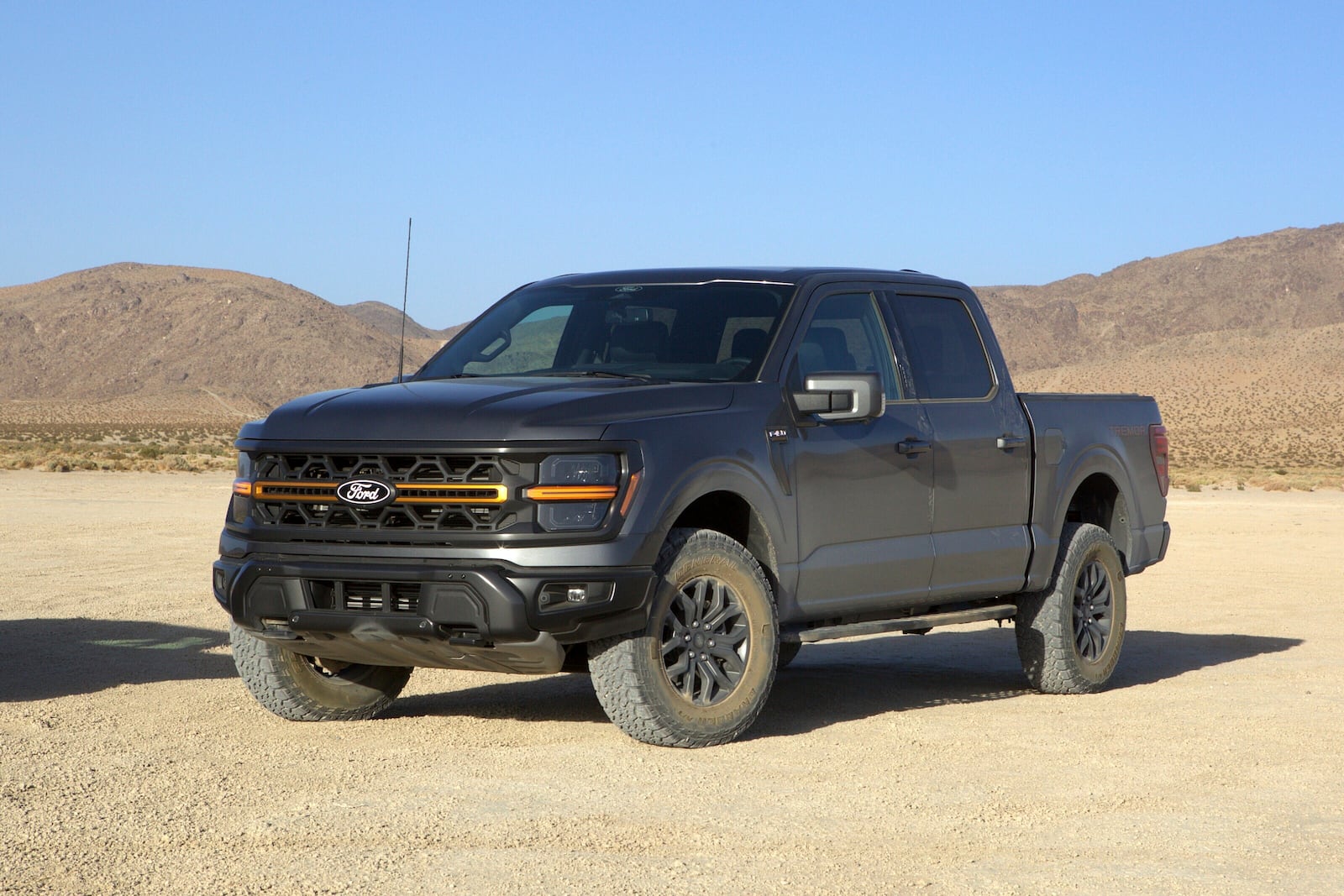 This photo provided by Edmunds shows the 2025 Ford F-150 Tremor, which features standard four-wheel drive, a choice of two V8s, and Trail Turn Assist, a feature that brakes the inside rear wheel to tighten the turning radius. (Courtesy of Edmunds via AP)