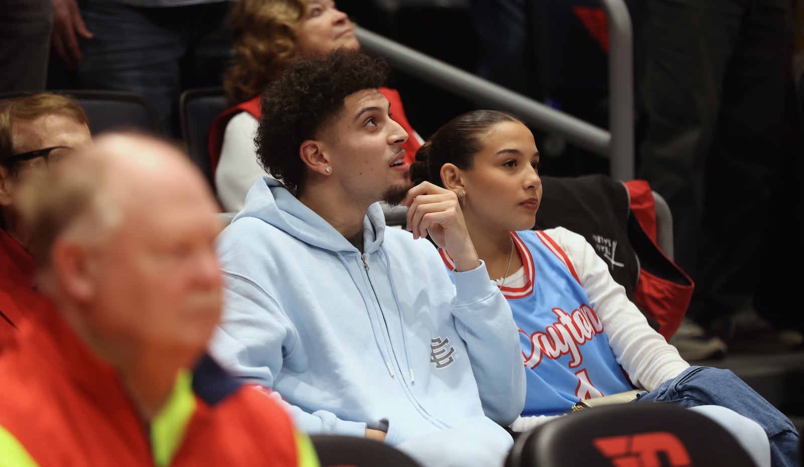 Former Dayton guard Koby Brea watches the Flyers play Capital on Saturday, Nov. 16, 2024, at UD Arena. David Jablonski/Staff