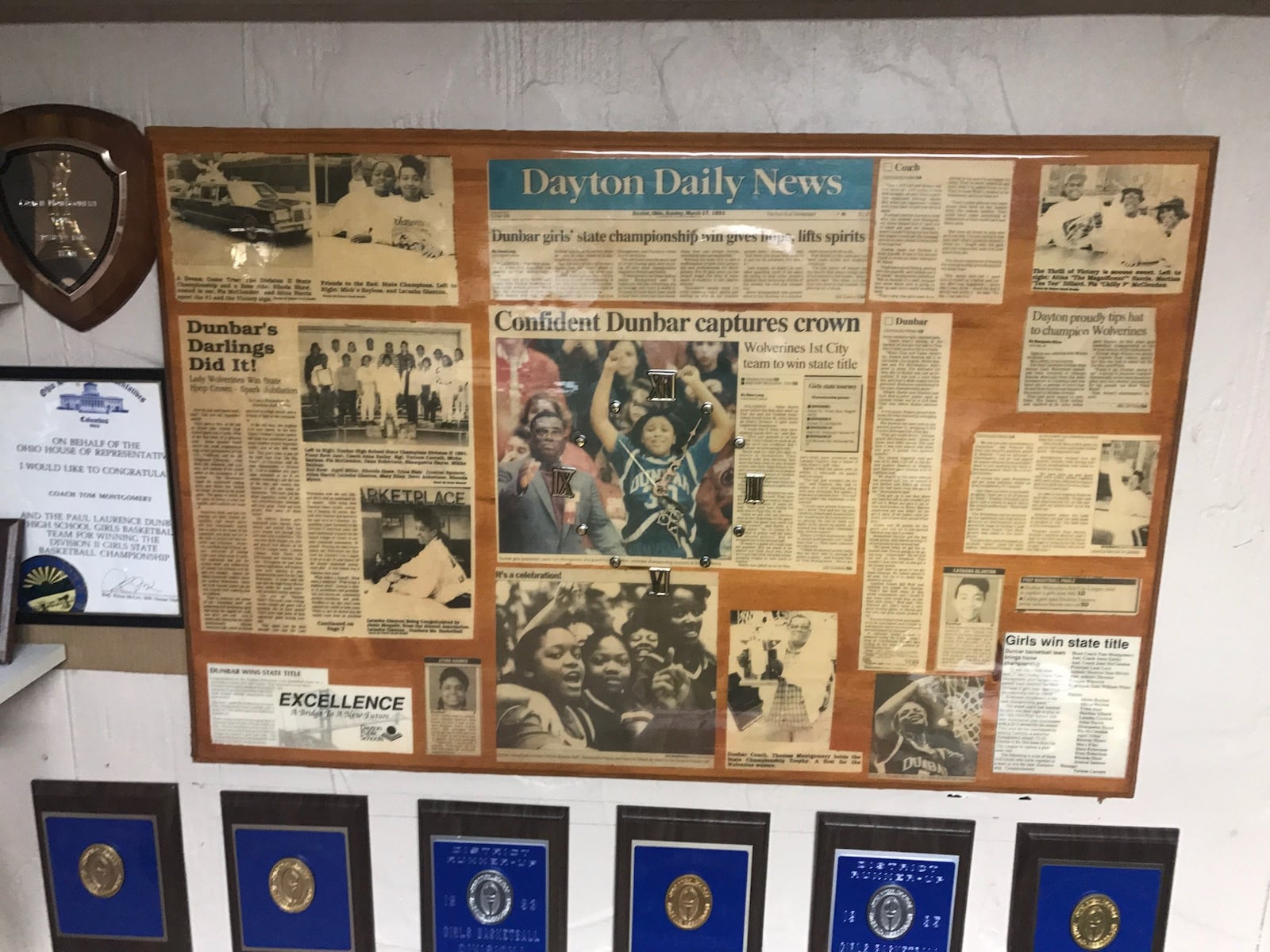 Area in Tom Montgomery’s basement dedicated to his 1991 Dunbar High girls basketball state championship team. Tom Archdeacon/CONTRIBUTED