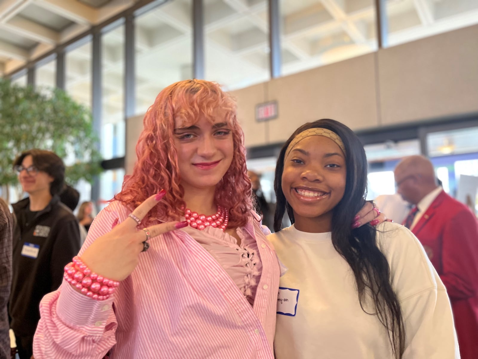 Camya Helton-Thomas, a 16-year-old senior at Stivers School for the Arts, and 17-year-old junior Rose Clark at a youth summit on Wednesday, Oct. 26, 2022. CORNELIUS FROLIK / STAFF