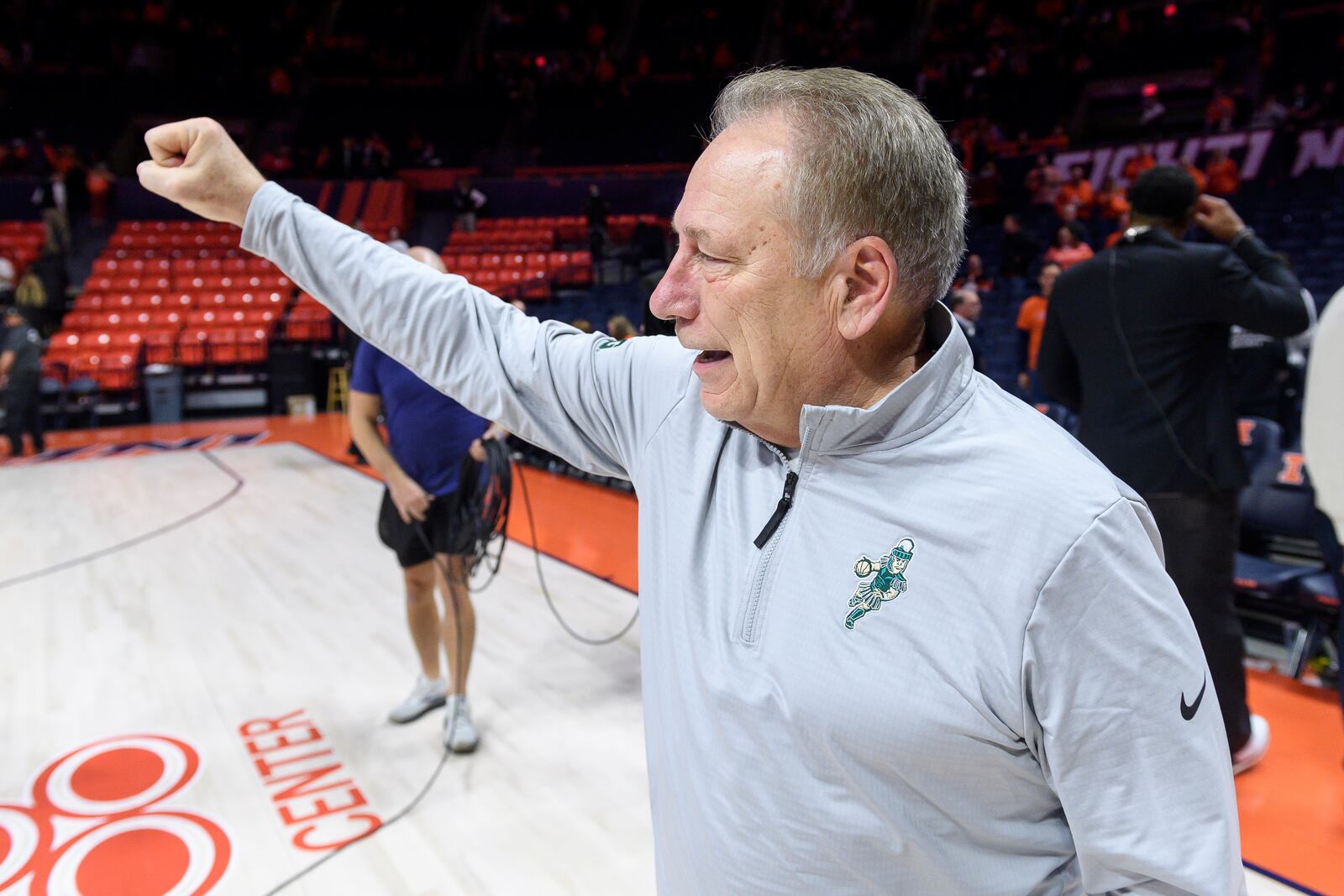 Michigan State Tom Izzo gestures to his fans after his record breaking win during an NCAA college basketball game against Illinois, Saturday, Feb. 15, 2025, in Champaign, Ill. (AP Photo/Craig Pessman)