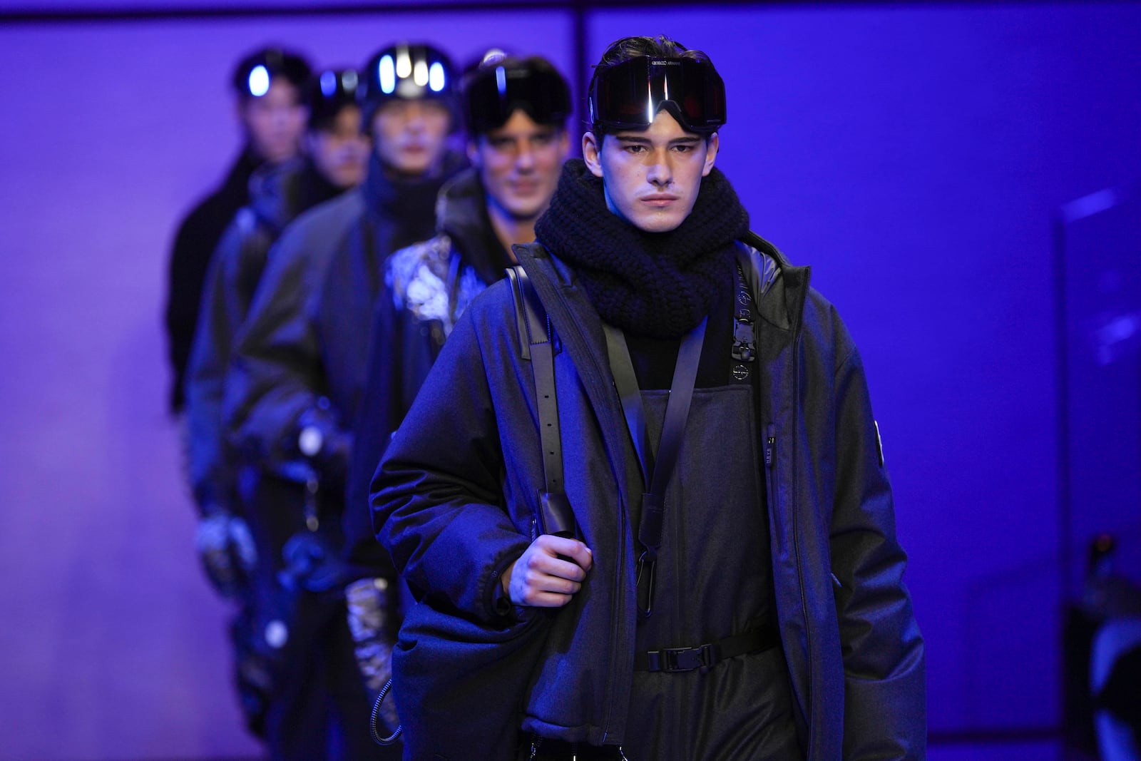 A model wears a creation part of the men's Giorgio Armani Fall-Winter 2025-2026 collection, that was presented in Milan, Italy, Monday, Jan. 20, 2025. (AP Photo/Antonio Calanni)