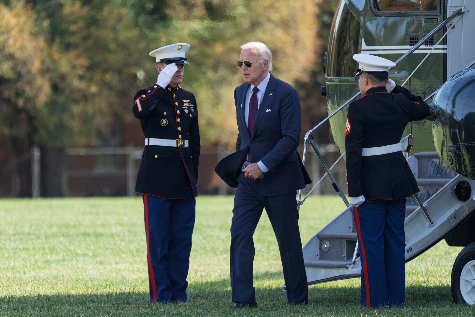 President Joe Biden walks from Marine One as he arrives at Fort McNair in Washington, Monday, Oct. 28, 2024. (AP Photo/Ben Curtis)