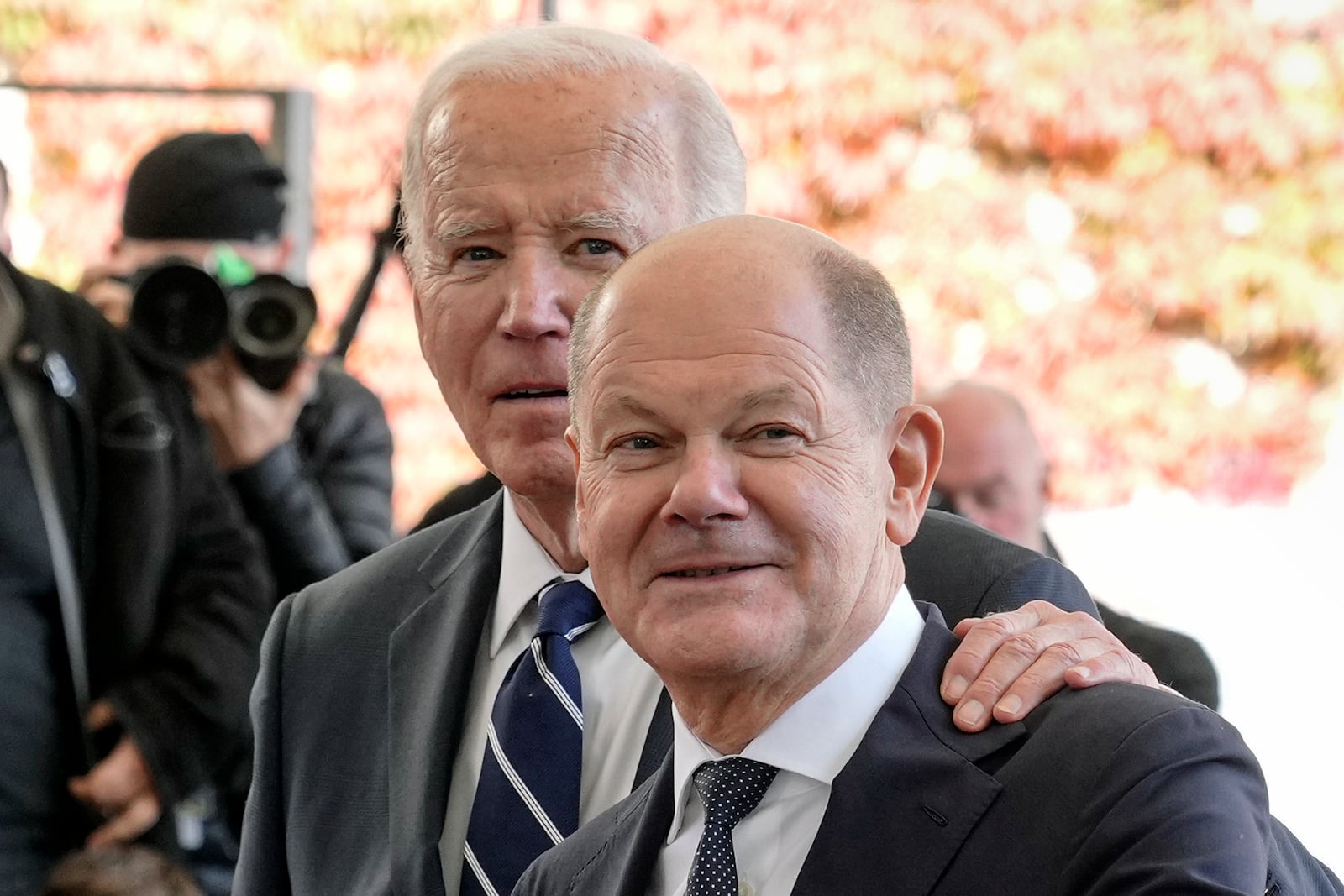 President Joe Biden puts his hand on the shoulder of German Chancellor Olaf Scholz at the Chancellery in Berlin, Germany, Friday, Oct. 18, 2024. (AP Photo/Markus Schreiber)