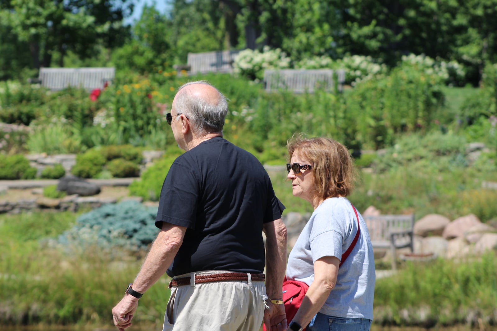 A couple strolls through Cox Arboretum. CORNELIUS FROLIK / STAFF