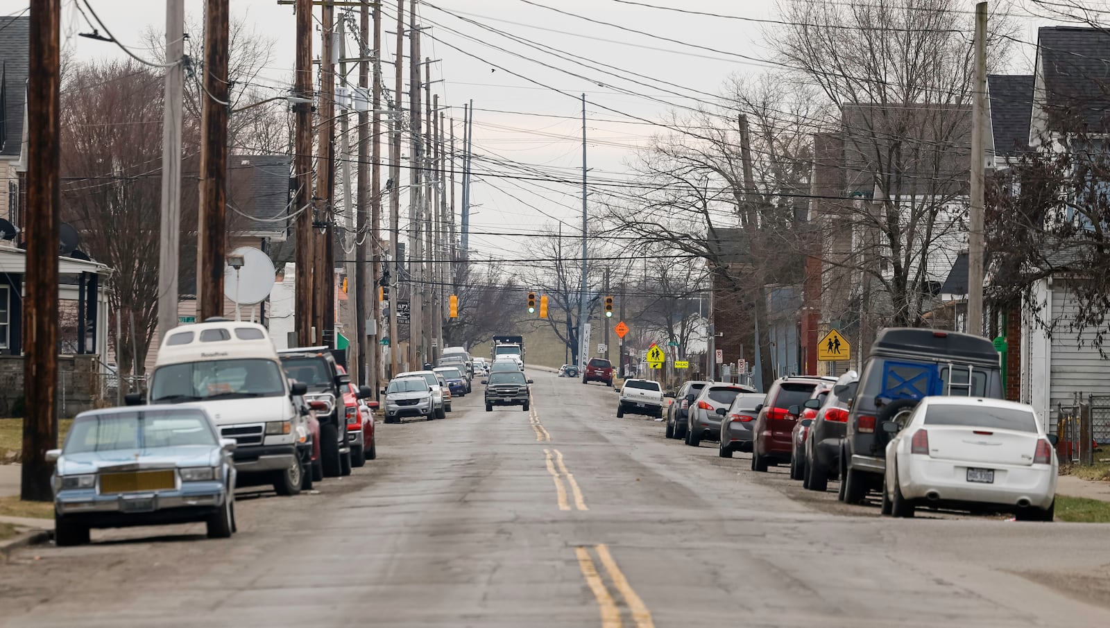 The city of Hamilton is considering a pilot program that could waive in some cases upwards of $9,200 of permit fees for new homes builds. These permit fees can be a barrier for new home construction. Hamilton officials are trying to find ways to encourage new homes being built, including on vacant lots in traditional neighborhoods like in Jefferson. City Council will consider the pilot program at their Feb. 26 and March 12, 2025, meetings. Pictured are cars on East Avenue in the Jefferson neighborhood in Hamilton. NICK GRAHAM/STAFF