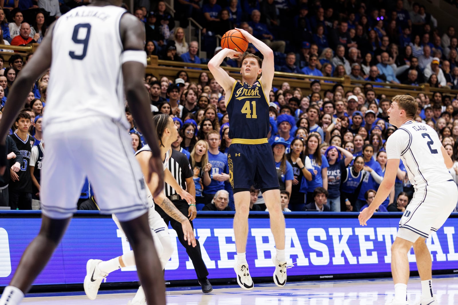 Notre Dame's Matt Allocco (41) attempts a shot during the first half of an NCAA college basketball game in Durham, N.C., Saturday, Jan. 11, 2025. (AP Photo/Ben McKeown)