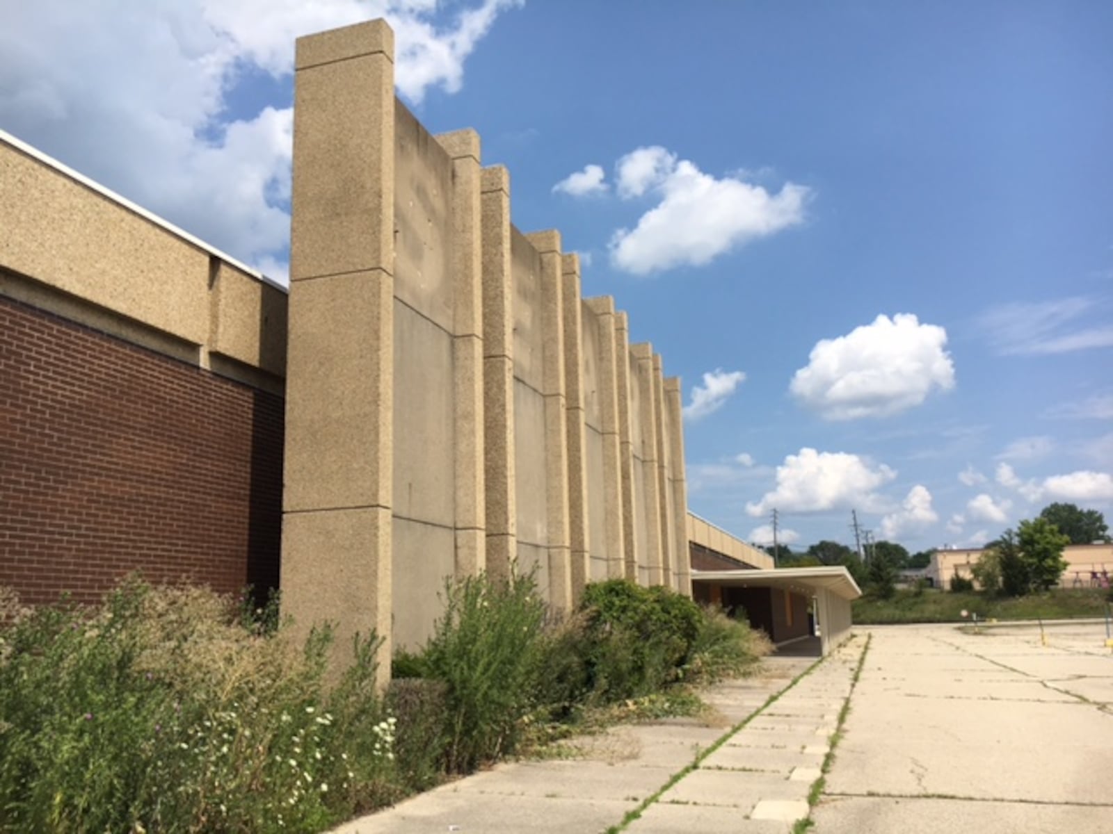 This worn facade was once the front of the Sears store which at one time anchored the Salem Mall, a mall which no longer exists. THOMAS GNAU/STAFF