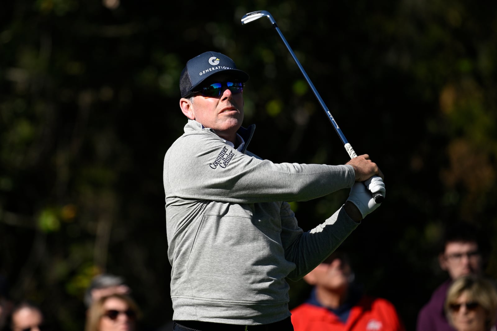 Justin Leonard watches his tee shot on the fourth hole during the first round of the PNC Championship golf tournament, Saturday, Dec. 21, 2024 in Orlando. (AP Photo/Phelan M. Ebenhack)