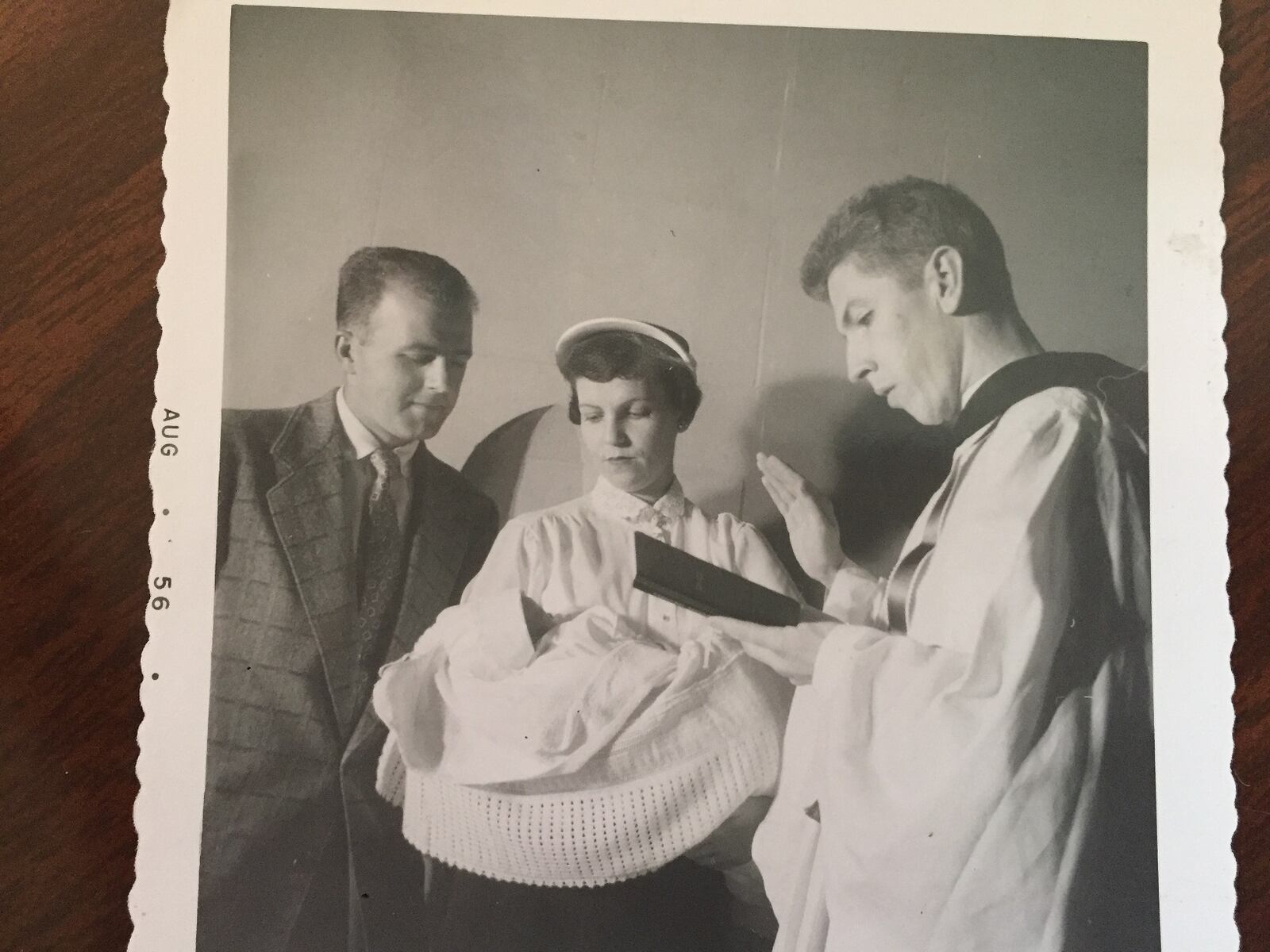 One of the original members, Bill Leibold, became an ordained Benedictine priest. Here, he returns to Dayton in 1956 for a baptism with the Rex Link family. CONTRIBUTED