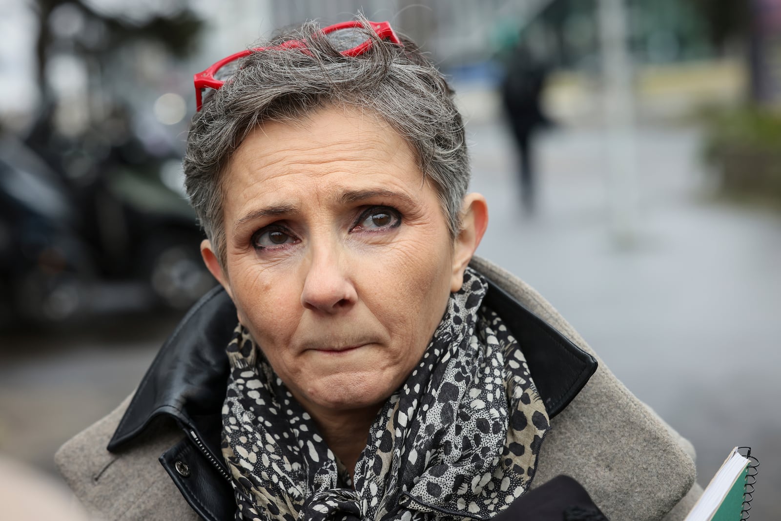 Dominique Pelicot 's lawyer Beatrice Zavarro answers reporters outside the Nanterre courthouse where the convicted rapist who horrified France by drugging his then wife, Gisele Pélicot, so other men could rape her, is now caught up in other cases, Thursday, Jan. 30, 2025 in Nanterre, outside Paris. (AP Photo/Thomas Padilla)