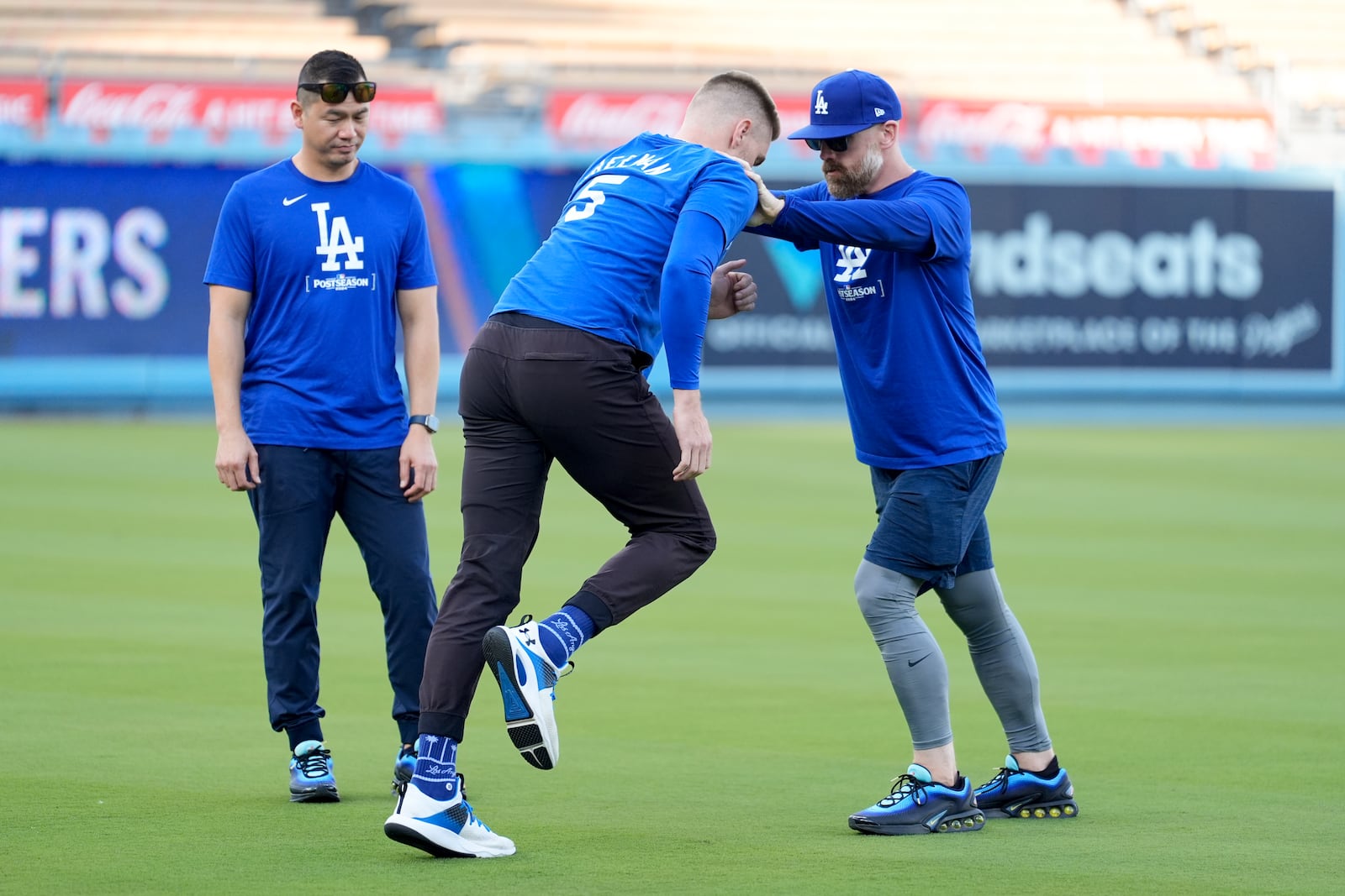 Los Angeles Dodgers' Freddie Freeman (5) works out ahead of Game 5 of a baseball NL Division Series against the San Diego Padres, Thursday, Oct. 10, 2024, in Los Angeles. (AP Photo/Ashley Landis)