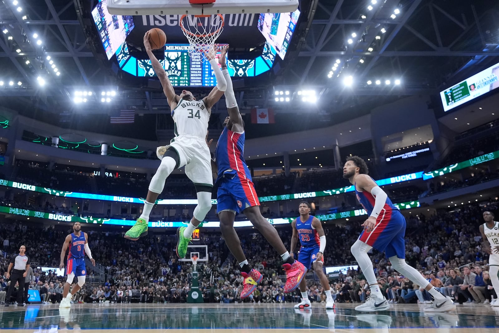 Milwaukee Bucks' Giannis Antetokounmpo shoots past Detroit Pistons' Jalen Duren during the second half of an NBA basketball game Wednesday, Nov. 13, 2024, in Milwaukee. (AP Photo/Morry Gash)