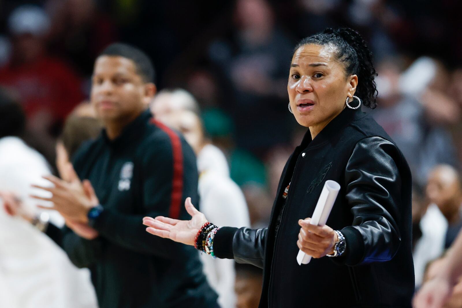 South Carolina head coach Dawn Staley reacts as her team plays against UConn during the first half of an NCAA college basketball game in Columbia, S.C., Sunday, Feb. 16, 2025. (AP Photo/Nell Redmond)