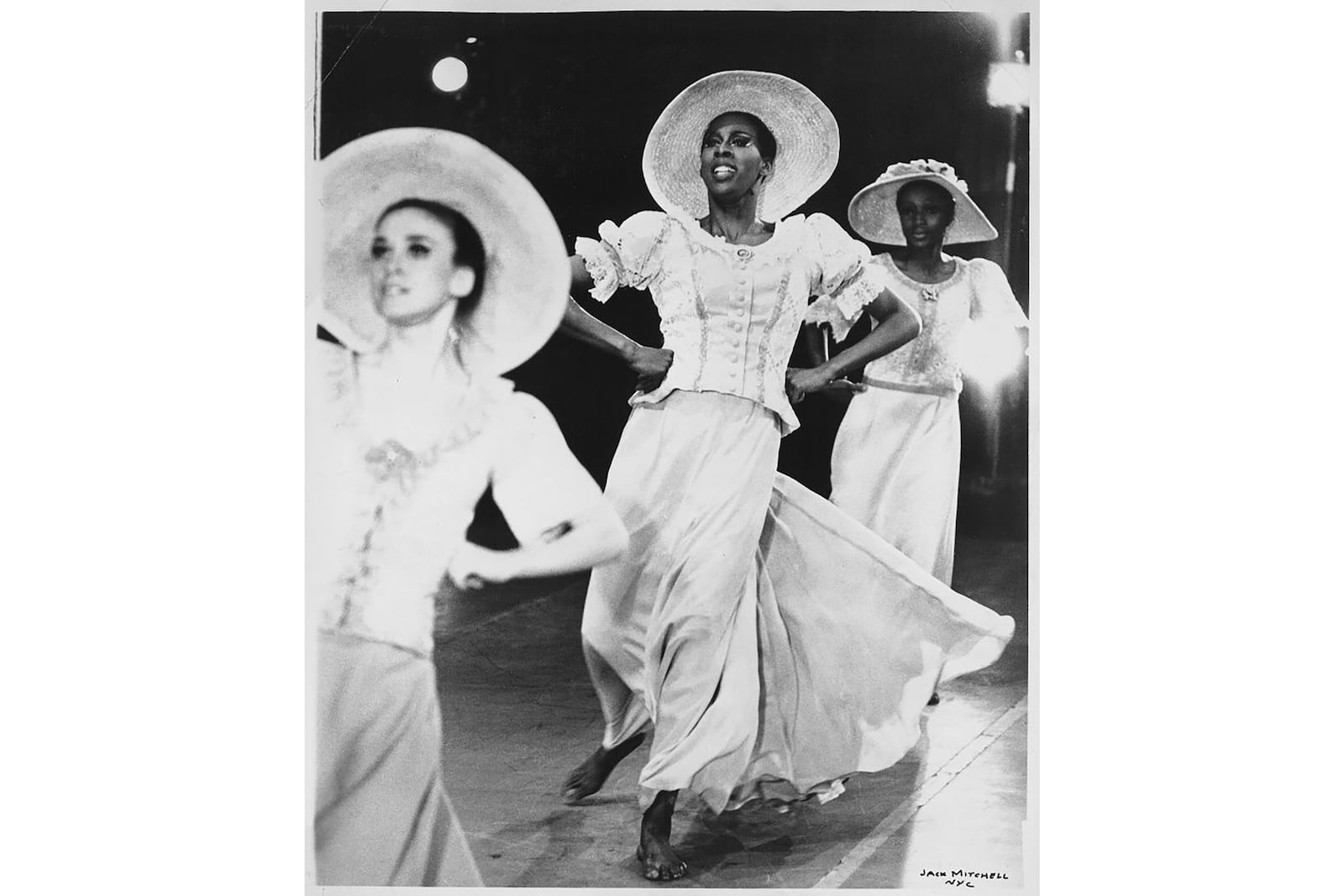 This undated photo provided by the Alvin Ailey Dance Foundation shows Judith Jamison, center, performing in Alvin Ailey's "Revelations." (Jack Mitchell/Alvin Ailey Dance Foundation and Smithsonian Institution via AP)