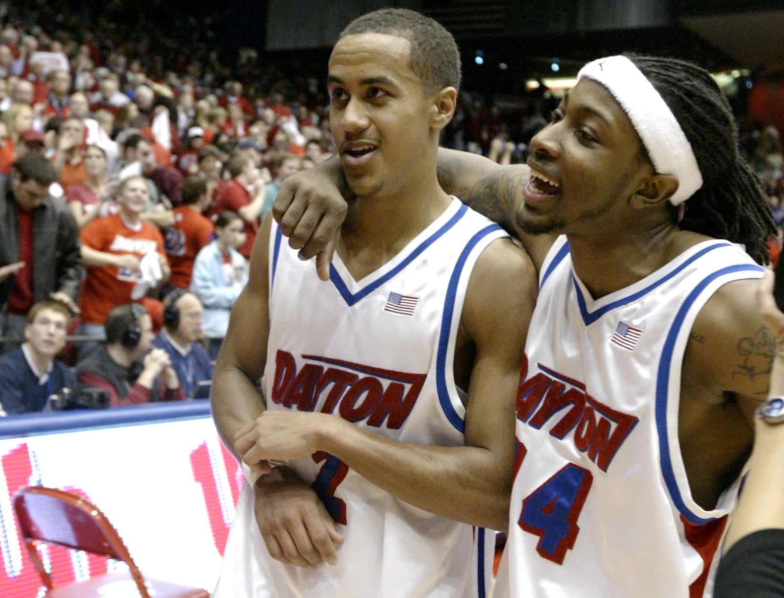 The University of Dayton's Brian Roberts (left) and London Warren leave the court Saturday night after beating the Pitt Panthers 80-55 in 2007. Roberts scored 31 points in the game. Staff photo by Lisa Powell