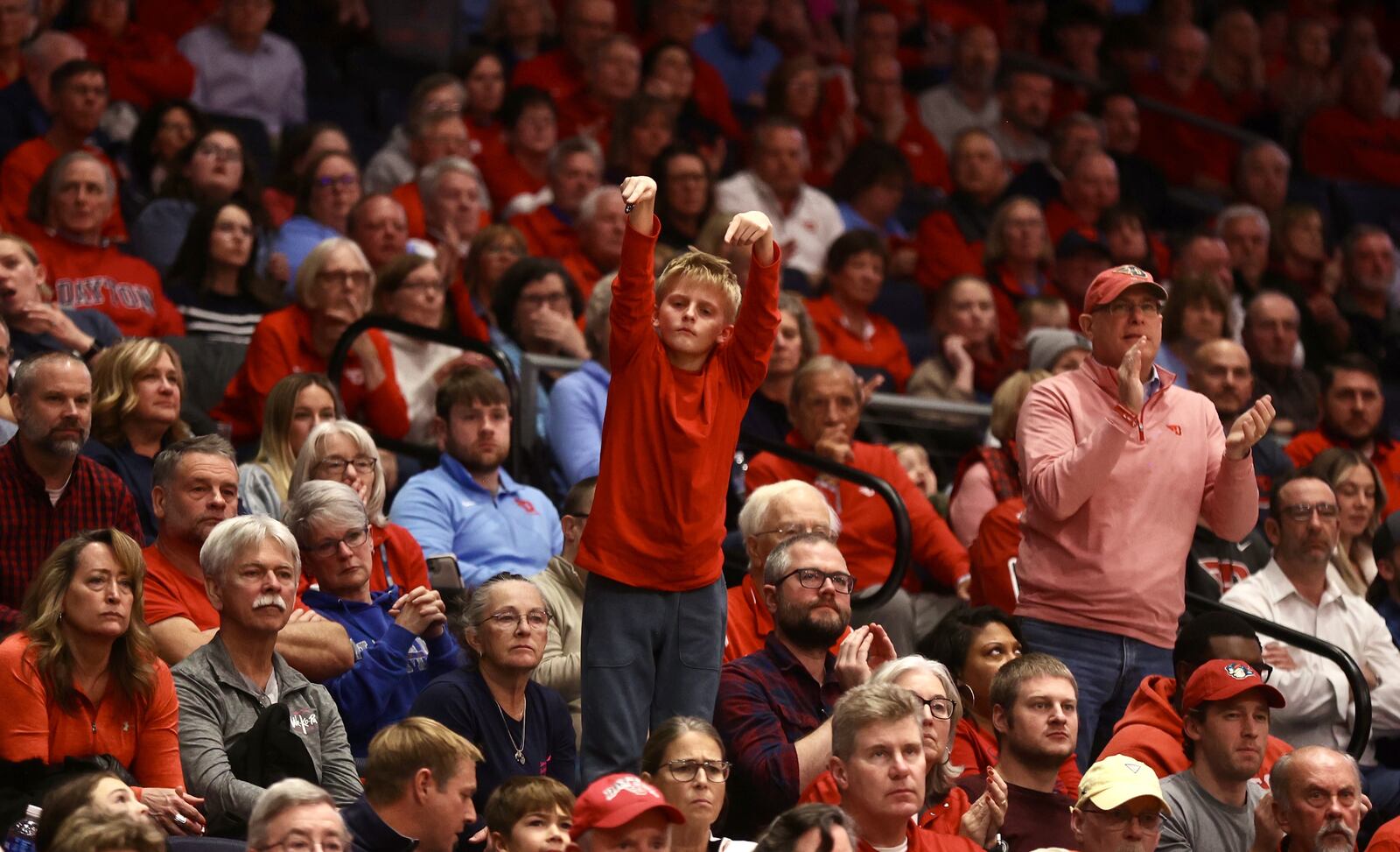 Dayton fans cheer during a game against Western Michigan on Tuesday, Dec. 3, 2024, at UD Arena. David Jablonski/Staff