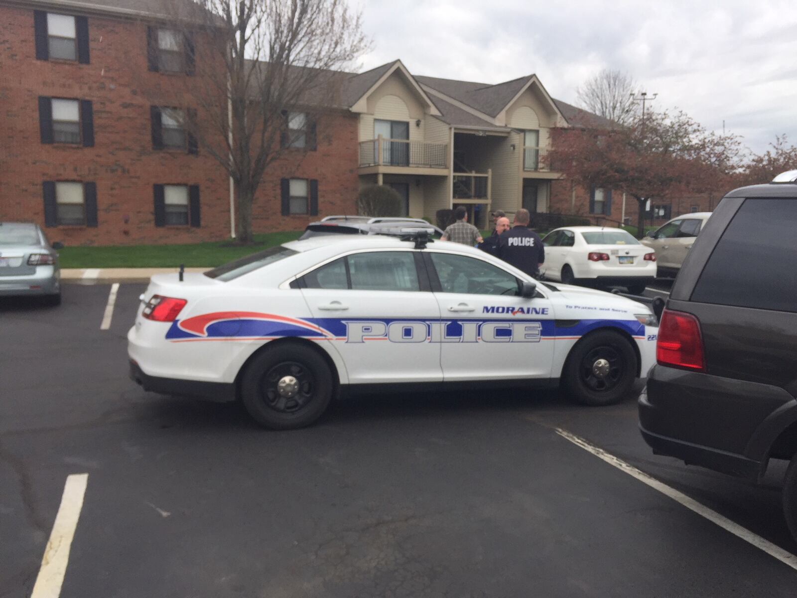 Police said one person was taken into custody at a Moraine apartment complex in connection to the fatal shooting of two people outside a Dayton nightclub. (Chuck Hamlin/Staff)