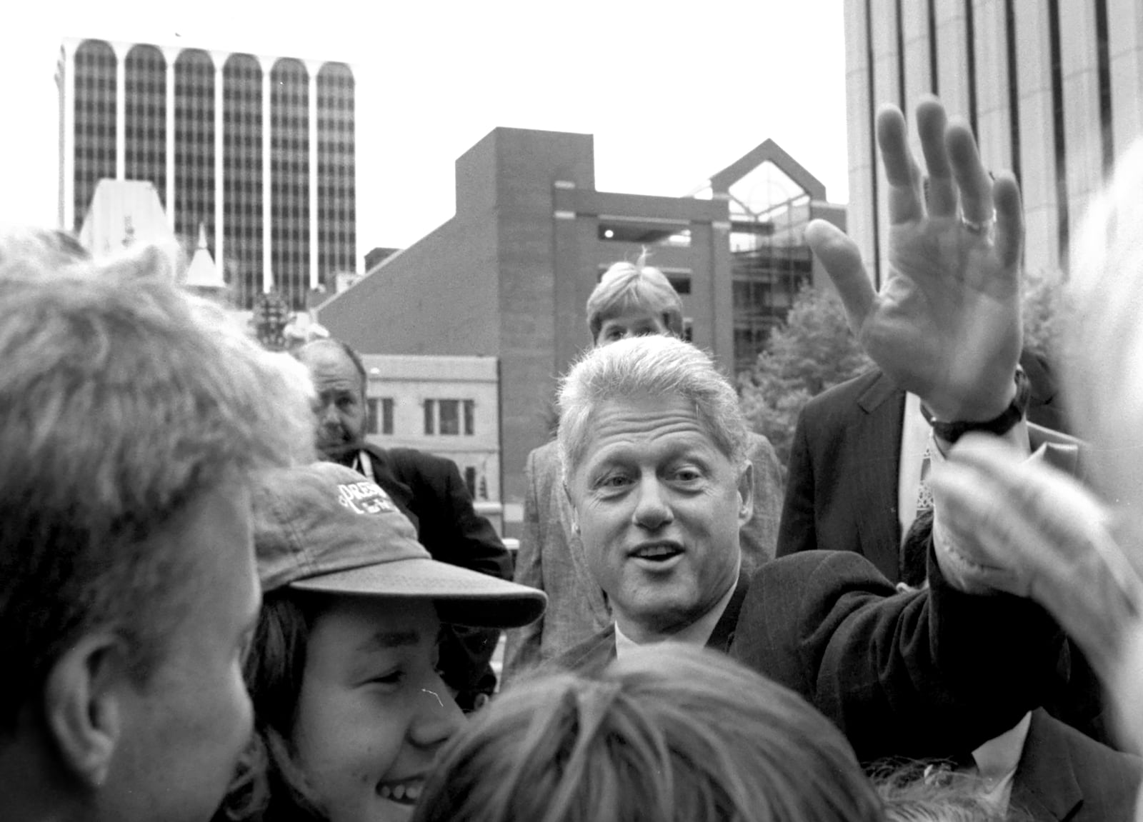 With downtown Dayton in the background, President Bill Clinton waves to the crowd at Courthouse Square October 10, 1996. DAYTON DAILY NEWS ARCHIVE