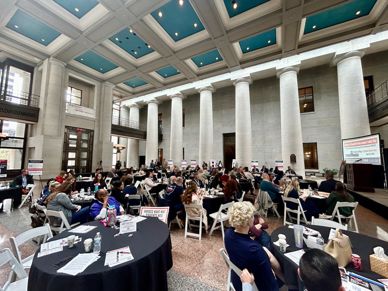 A group of nurses and advocates gathered in the Ohio Statehouse Atrium to pressure lawmakers into passing a bill that would require mandatory nurse-to-patient minimums in Ohio hospitals. Wednesday, April 24, 2024.