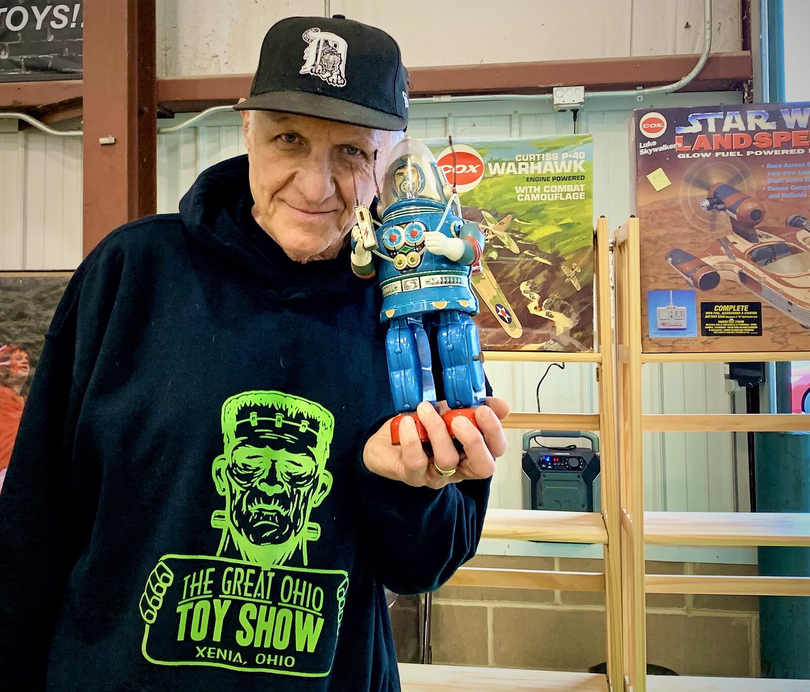 Tesco Vee, punk rocker turned toy aficionado, shows off a Japanese Rosko Astronaut made in the early 60's, while setting up for the Great Ohio Toy Show this weekend. LONDON BISHOP/STAFF