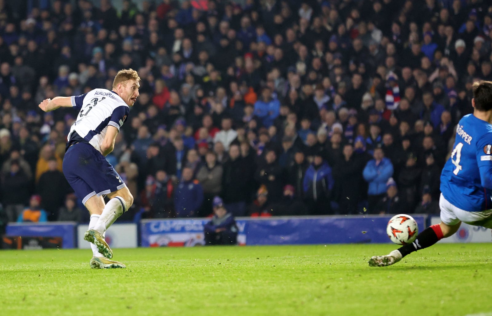 Tottenham Hotspur's Dejan Kulusevski scores their side's first goal of the game against Rangers during a UEFA Europa League soccer match at the Ibrox Stadium, Thursday, Dec. 12, 2024, in Glasgow, Scotland. (Steve Welsh/PA via AP)