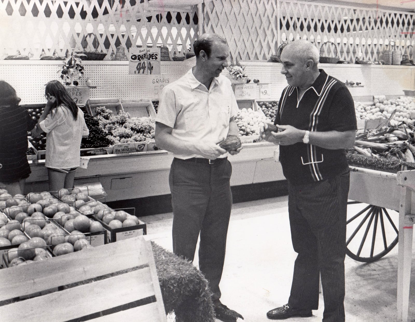 Woody Bowman (right) the founder of Woody's Market in West Carrollton and produce manager Claude Leach photographed in 1971. DAYTON DAILY NEWS ARCHIVE