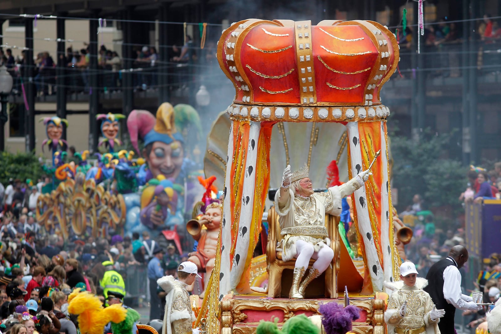 FILE - Rex, the King of Carnival, rides in the Krewe of Rex as he arrives at Canal St. on Mardi Gras day in New Orleans, March 8, 2011. (AP Photo/Gerald Herbert, File)