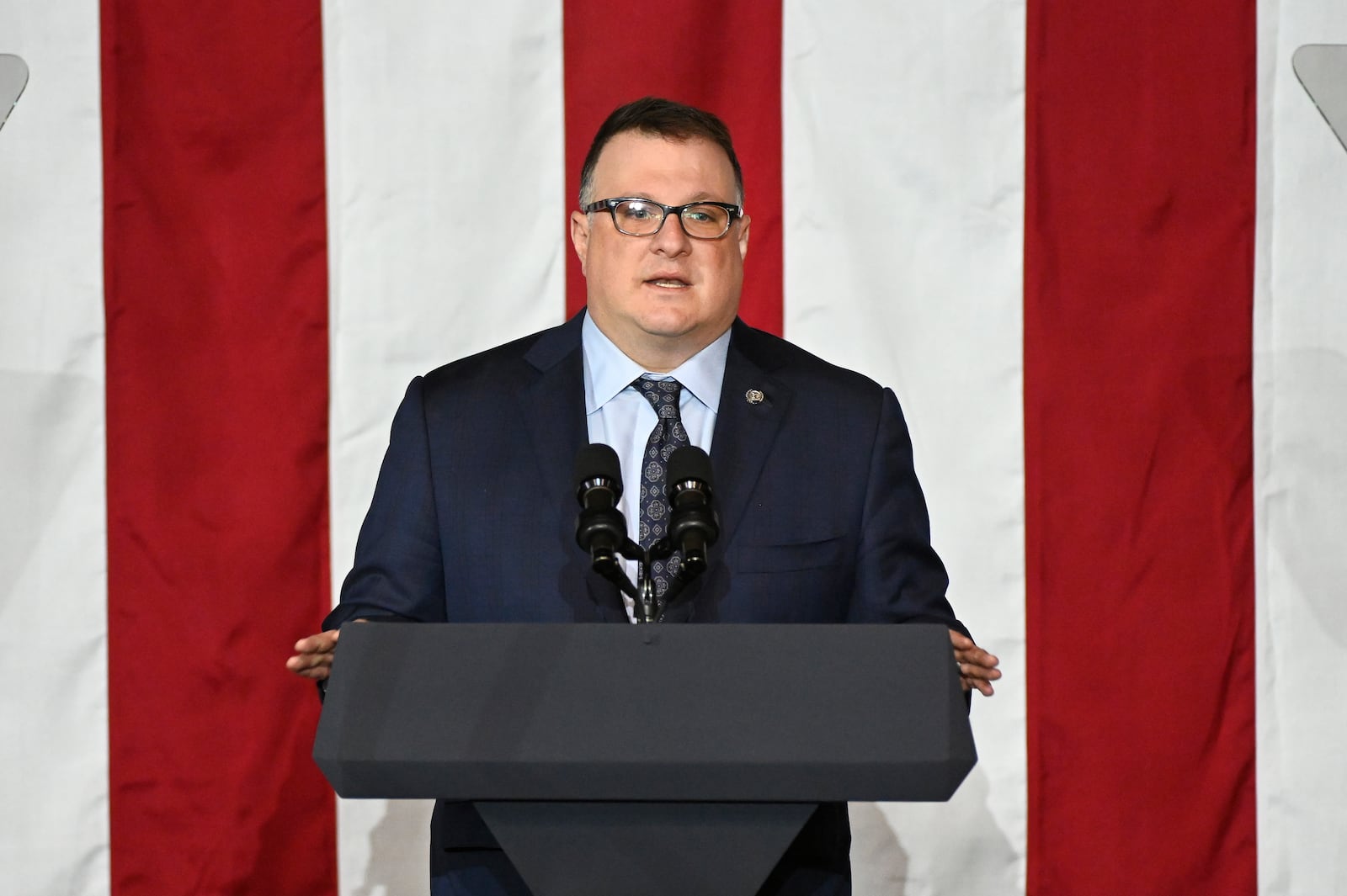 Michigan House Speaker Matt Hall, R-Richland Twp., speaks at a rally before Vice President JD Vance speaks about "America's industrial resurgence," Friday, March 14, 2025, at Vantage Plastics in Bay City, Mich. (AP Photo/Jose Juarez)