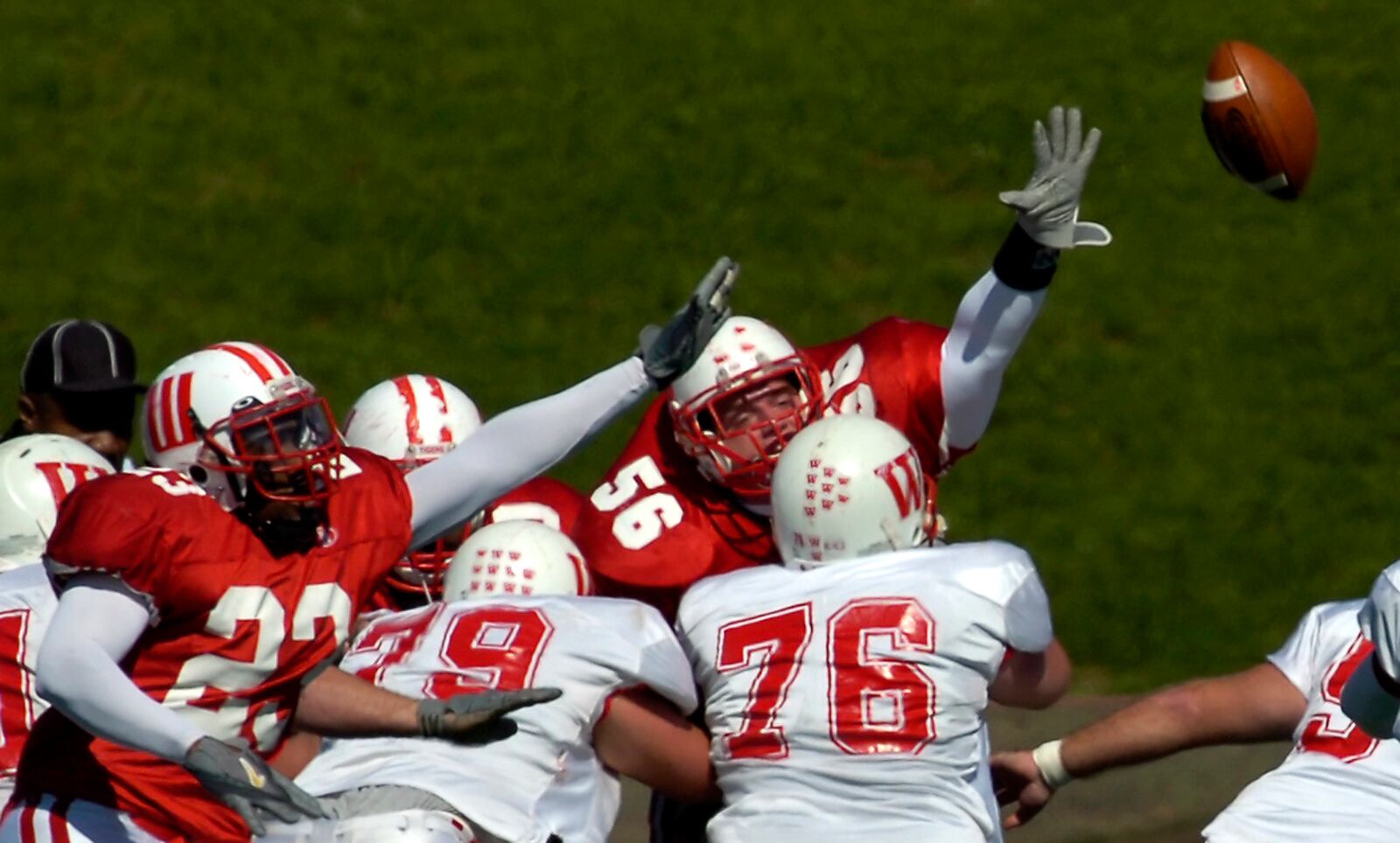 Wittenberg's Lavon Wilborn, left, and Lance Phillips reach up as they try to block a Wabash field goal in the first half of Saturday's game in 2006.  Staff photo by Bill Lackey