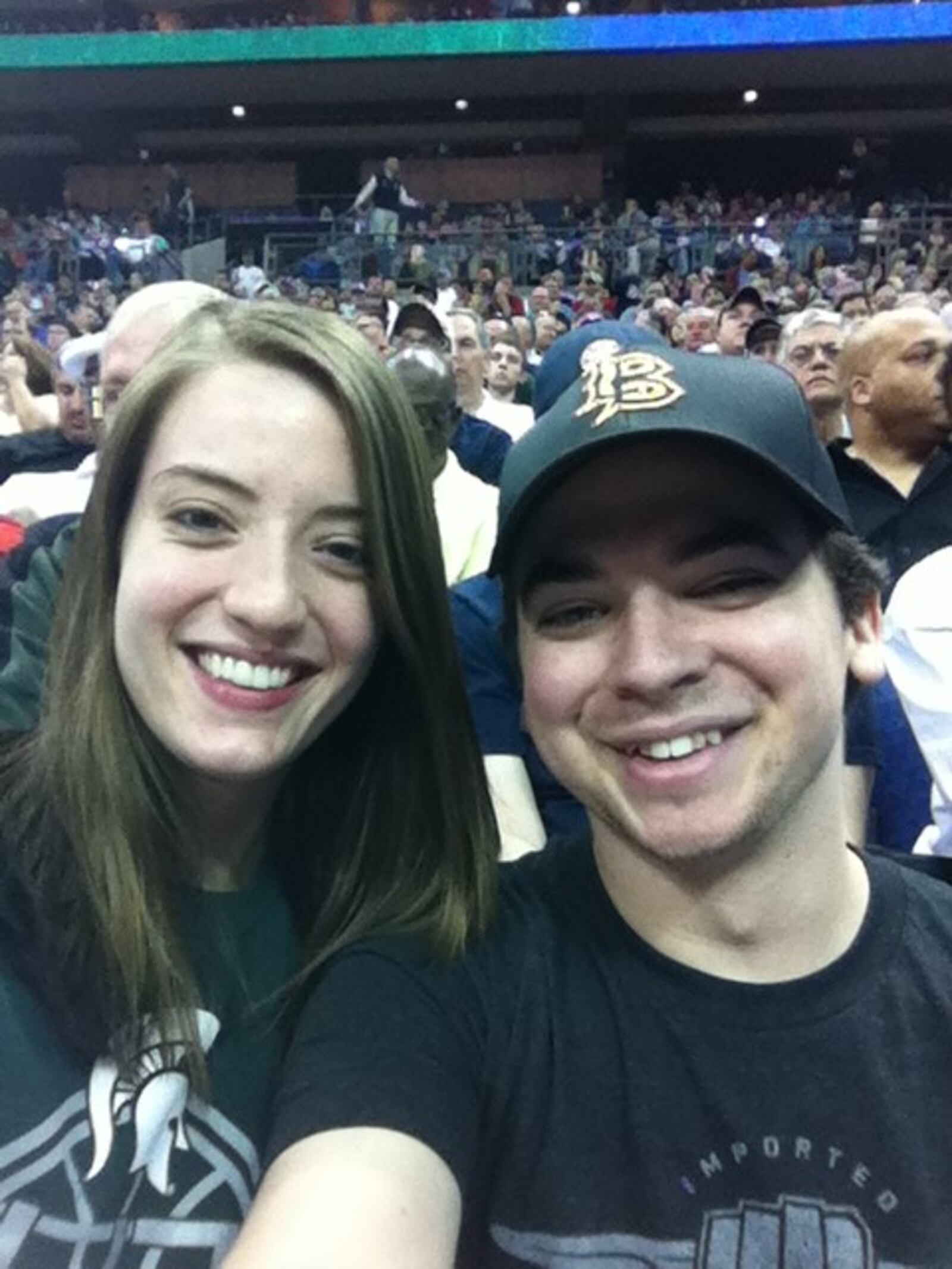 Craig Caswell and his wife Jaclyn Meyer at the NCAA Tournament in Columbus in March 2012. Craig – often accompanied by Jaclyn – is just two games away from completing his quest to watch a game involving each of the 363 college teams now playing Division I basketball. CONTRIBUTED