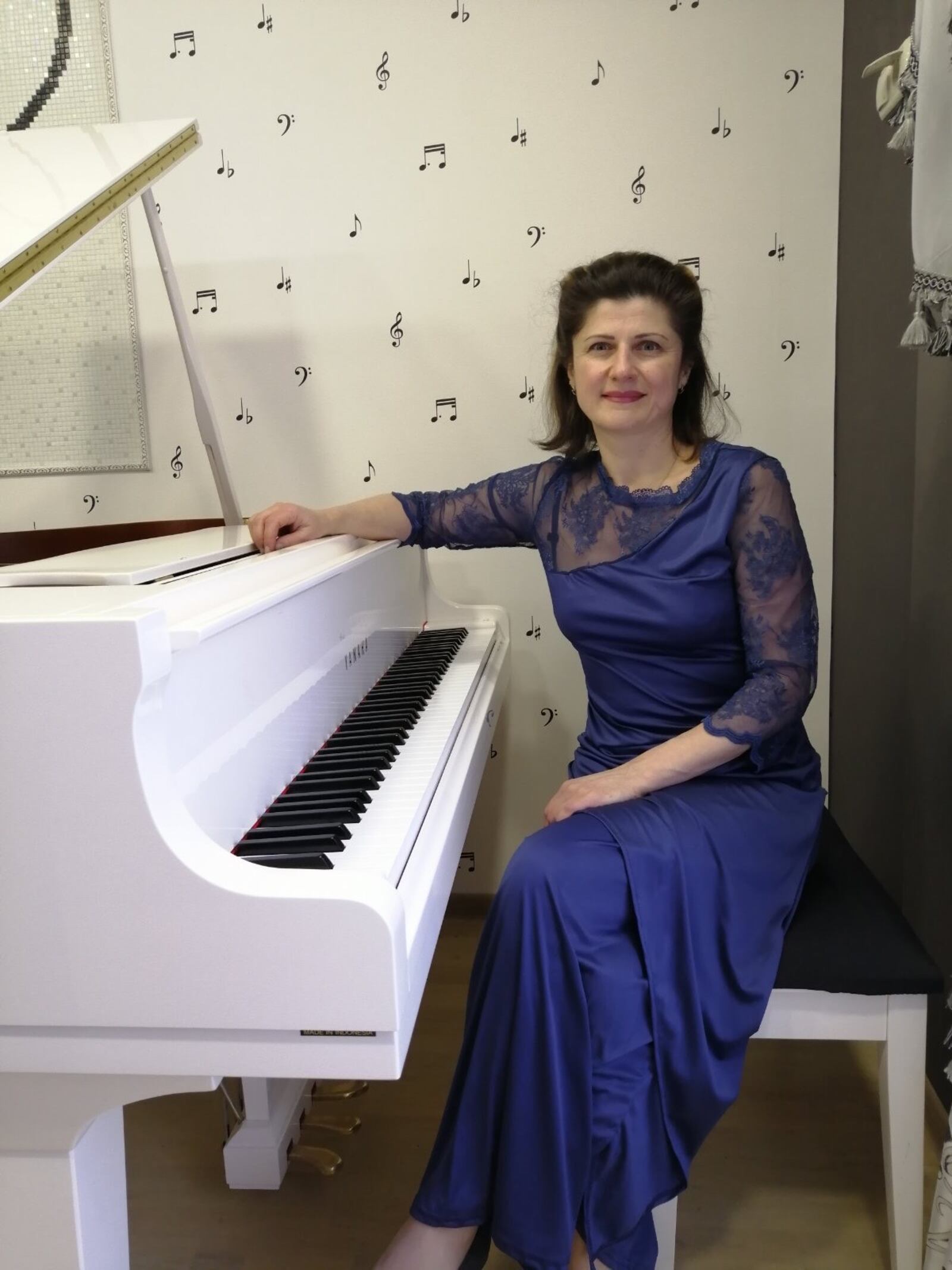 Yulia Sukhovii, a concert pianist, will be performing in a subway at an event commemorating the third anniversary of the invasion.