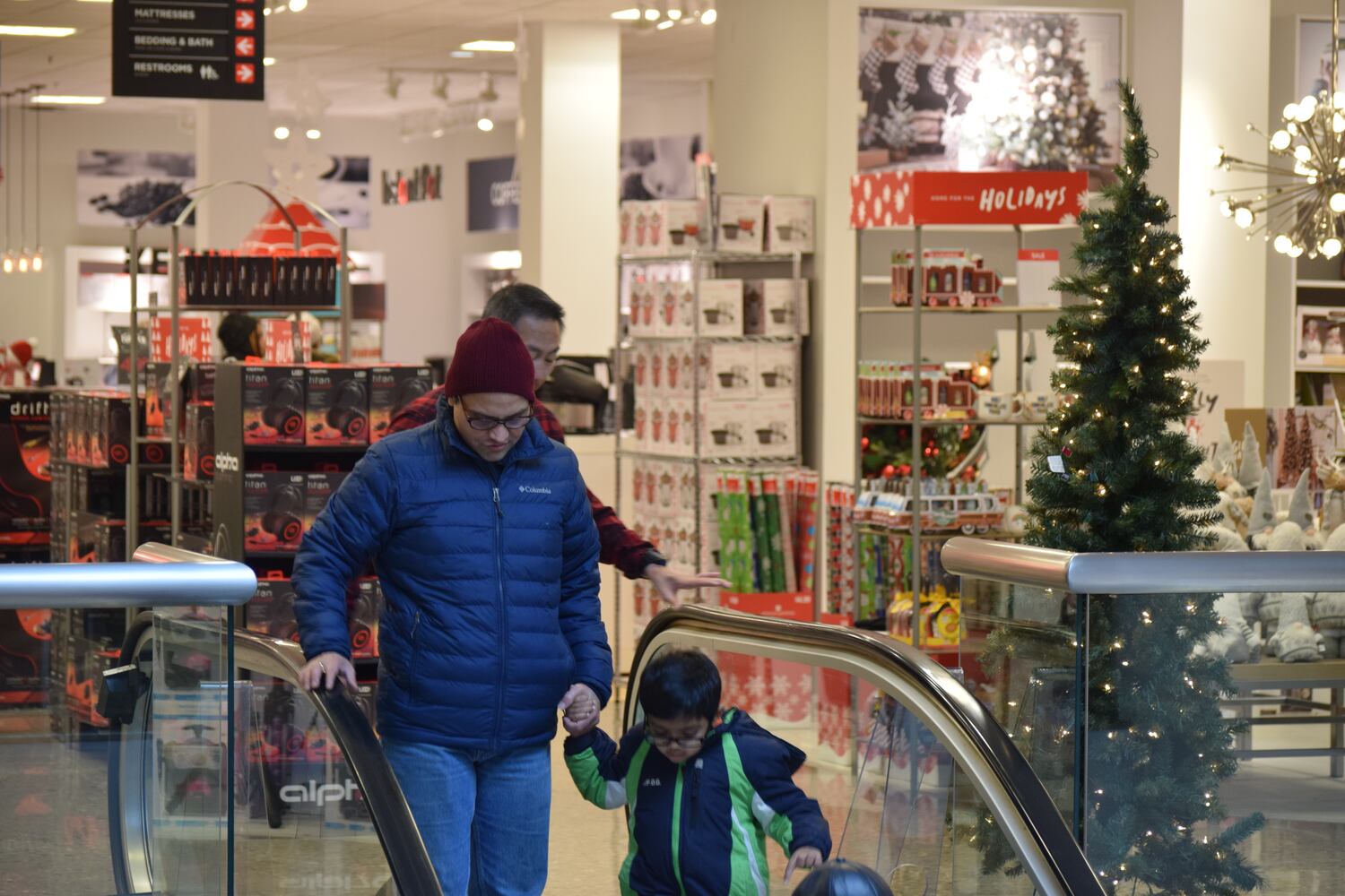 PHOTOS: Hundreds like up outside JCPenney for doorbusters, coupons