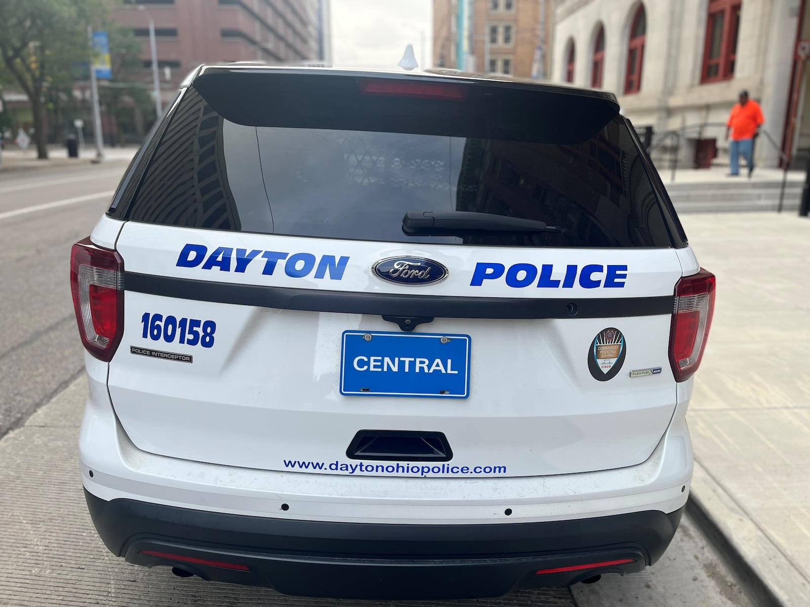 A Dayton Police Department cruiser parked outside of City Hall. CORNELIUS FROLIK / STAFF