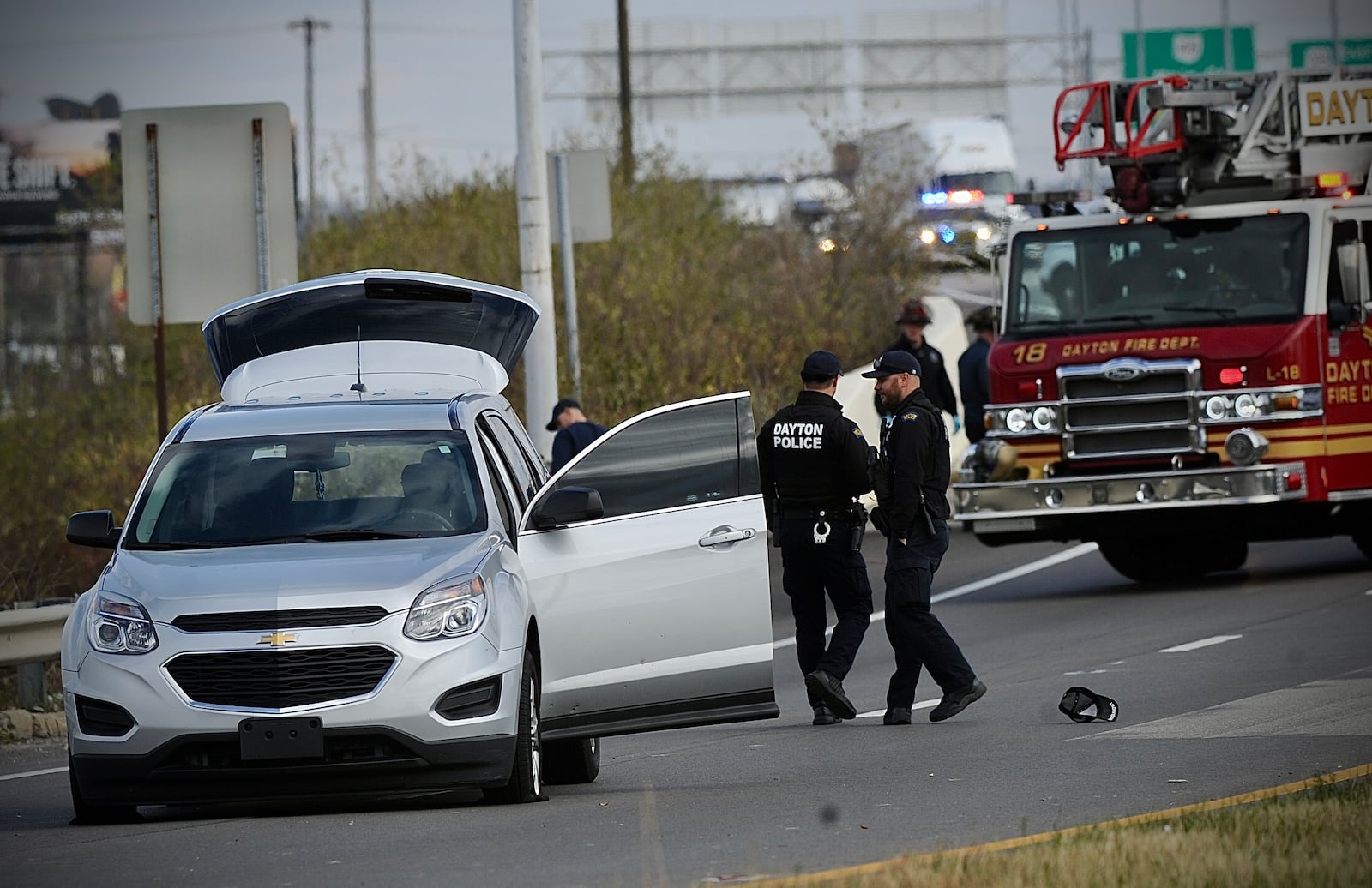 The U.S. 35 West ramp to Interstate 75 was closed Monday, November 14, 2022 afternoon after a shooting was reported in Dayton. MARSHALL GORBY \STAFF