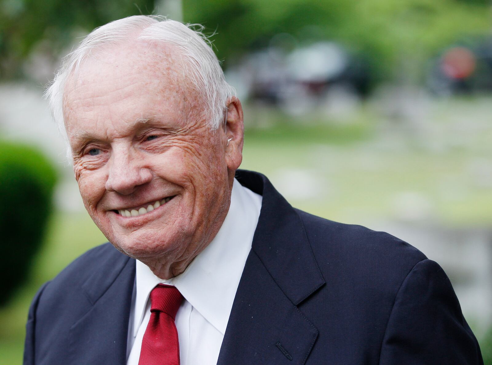 Neil Armstrong, the first man to walk on the moon, is pictured Friday, June 1, 2012, following a graveside service for Wilbur Wright on the 100th anniversary of the burial of the powered flight pioneer. Wright died at age 45 of typhoid fever on May 30, 1912. Wilbur Wright's grave is near his brother Orville's in the Wright family plot at Woodland Cemetery in Dayton, Ohio. STAFF PHOTO BY CHRIS STEWART