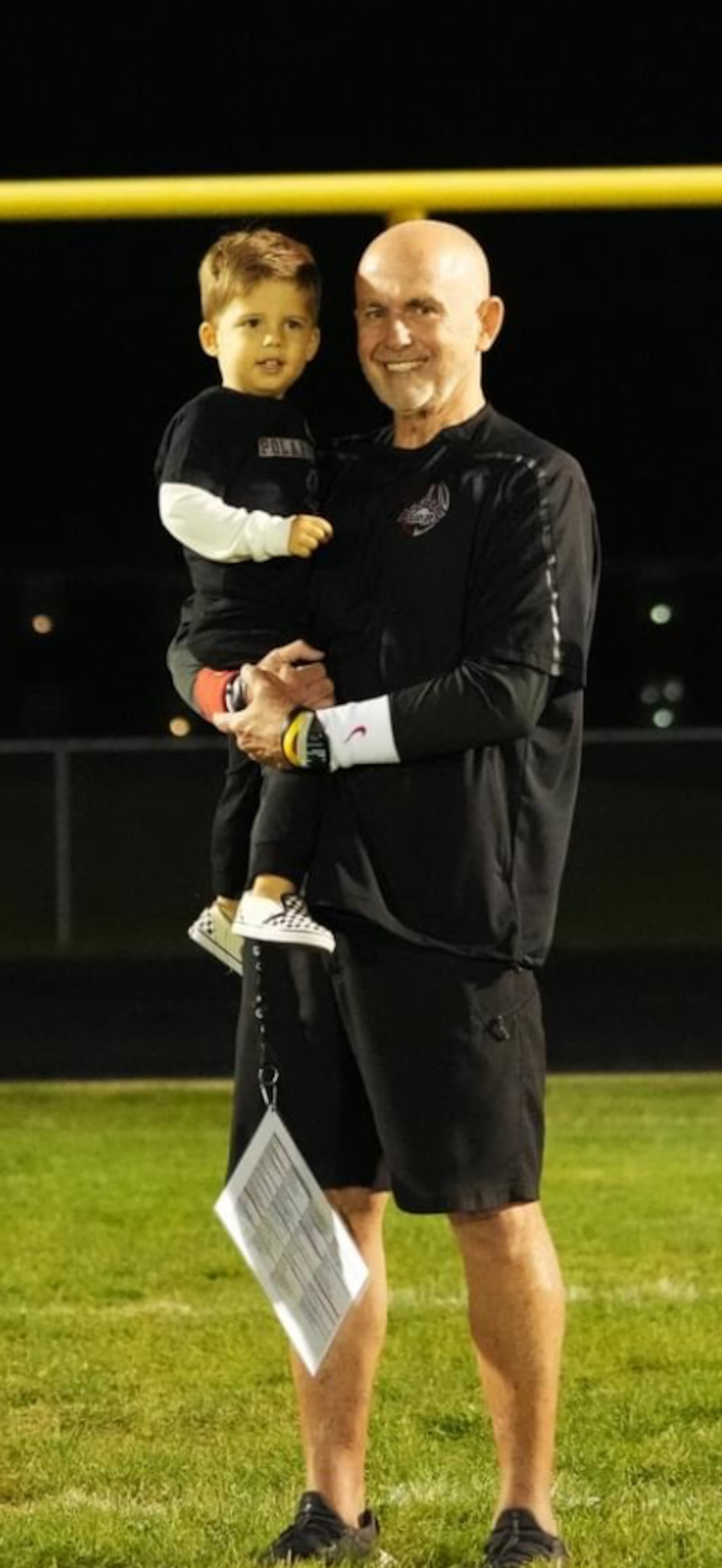 Bob Smith with grandson Calvin after Northridge beat Sidney Lehman last Friday night  to win the Three Rivers Conference championship. CONTRIBUTED