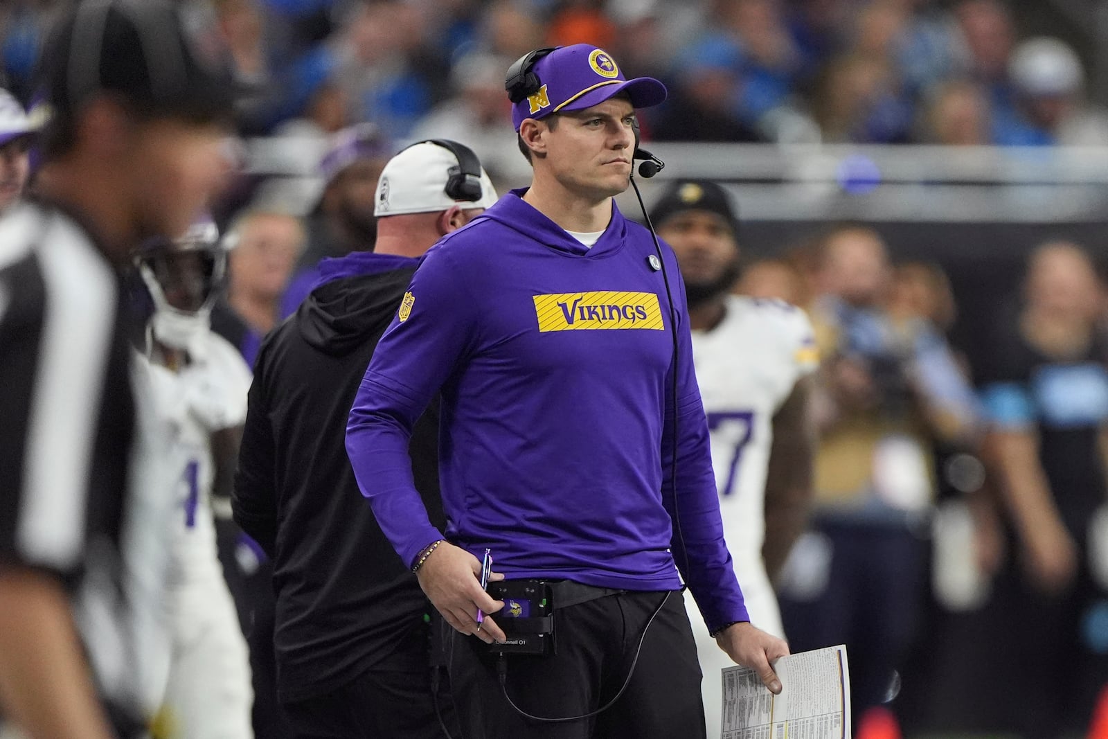 Minnesota Vikings head coach Kevin O'Connell watches from the sidelines during the first half of an NFL football game against the Detroit Lions, Sunday, Jan. 5, 2025, in Detroit. (AP Photo/Charlie Riedel)