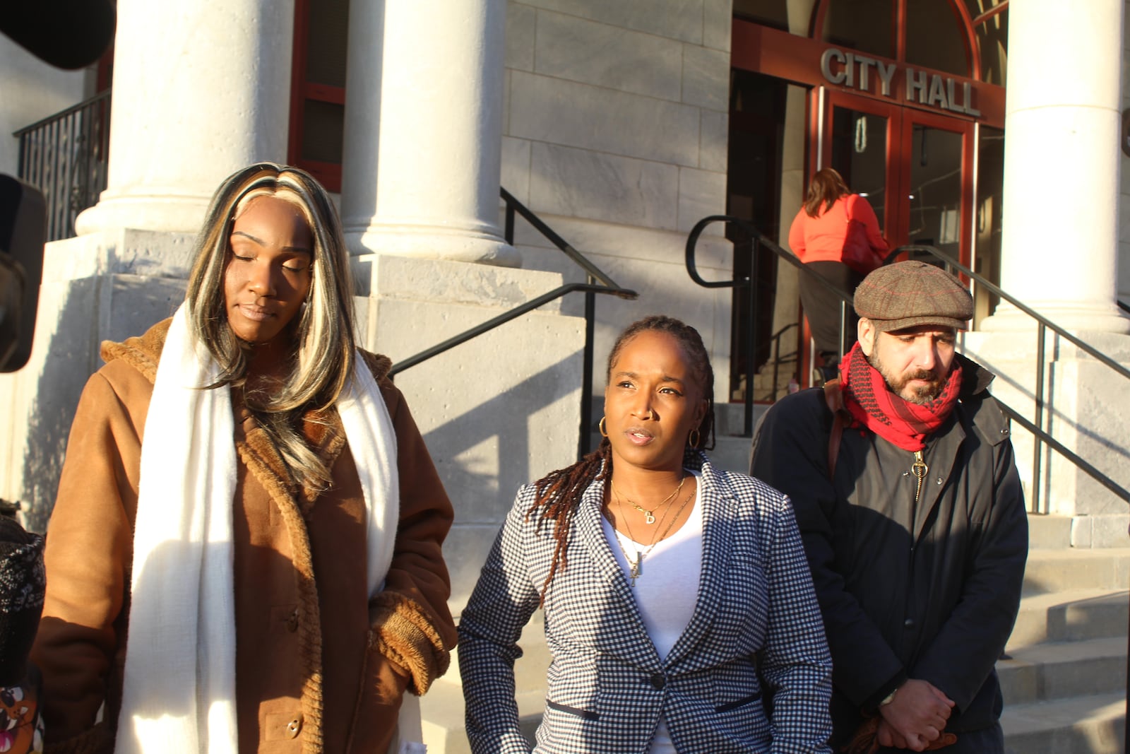 Alice Wood, Destiny Brown and Alexander Gorman outside of City Hall in downtown Dayton. Wood and Gorman are members of the Dayton Tenant Union. Brown is a community organizer with Advocates for Basic Legal Equality Inc. (ABLE). CORNELIUS FROLIK / STAFF