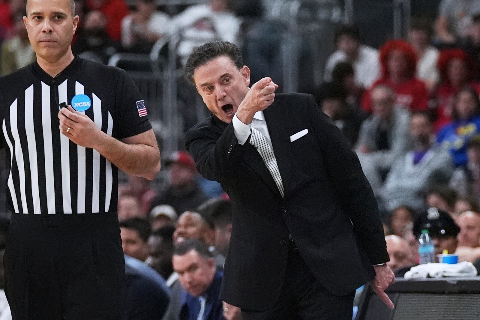 St. John's head coach Rick Pitino argues a call during the first half in the first round of the NCAA college basketball tournament, Thursday, March 20, 2025, in Providence, R.I. (AP Photo/Charles Krupa)