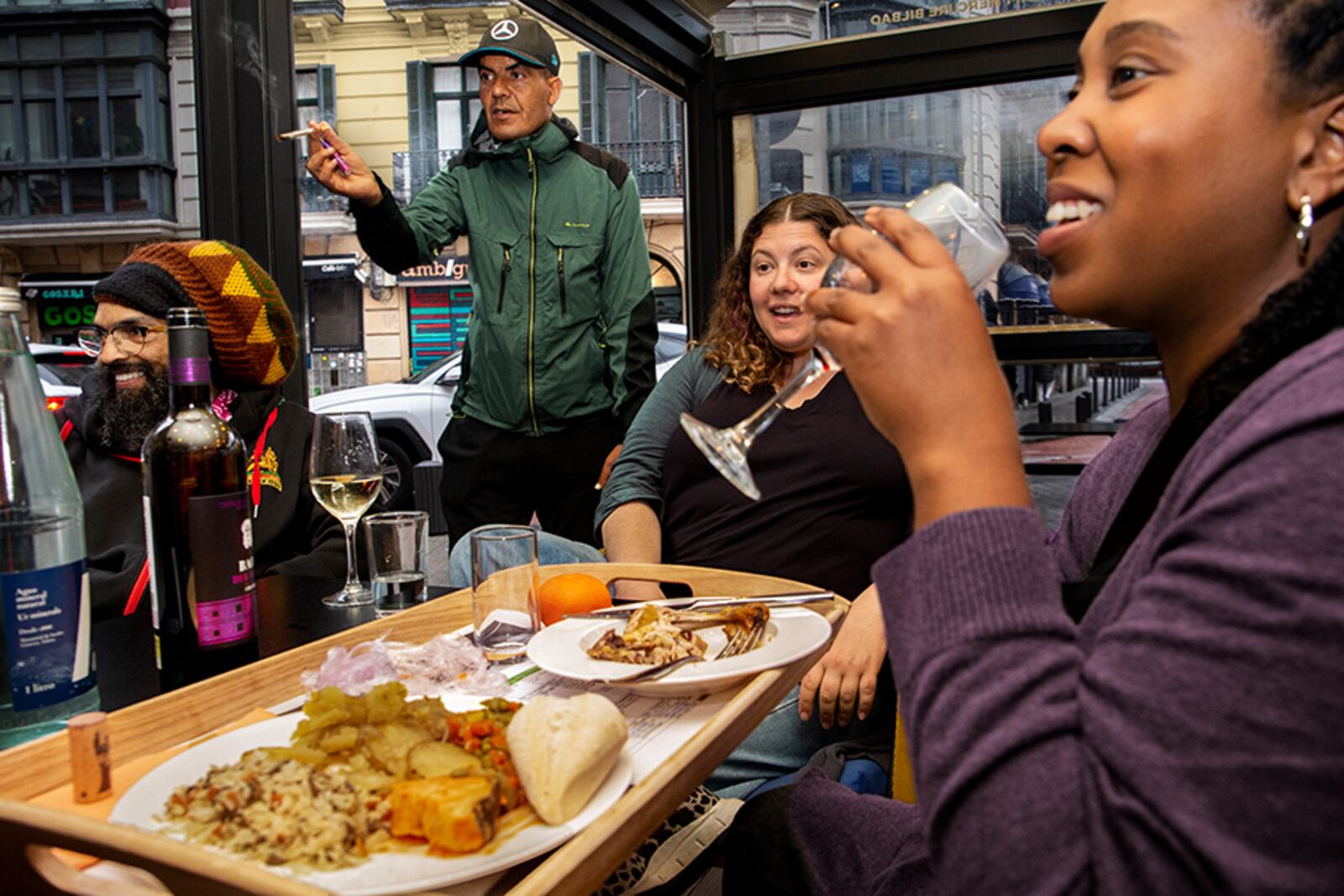 A photograph by Glenna Jennings from the ongoing series At Table, titled "At Table (potatoes, rice, wine), Bilbao, Spain", 2023
"This was from a recent trip to Bilbao and Mondragon (Basque Country) with Co-op Cincy and Co-op Dayton. I was so grateful to be invited and have the support of UD and the Hanley Sustainability Institute in joining my longtime community partners on this journey to learn more about the cooperative culture and businesses that inspired Gem City Market. These are fellow Daytonians amaha sellassie, Cherelle Gardener and Lela Klein."
