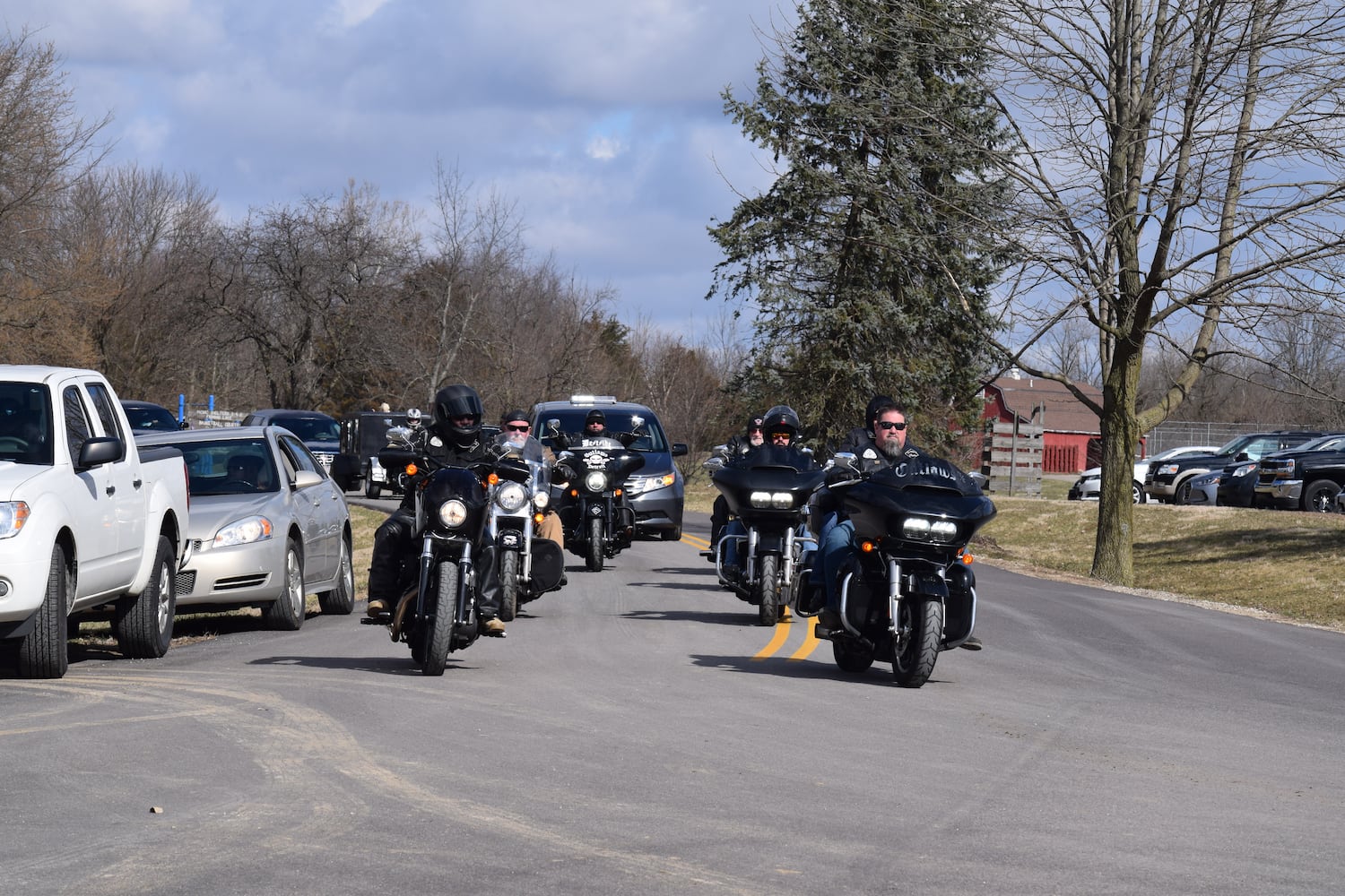 PHOTOS: Thousands of Outlaws attend motorcycle gang leaders funeral at Montgomery County Fairgrounds.