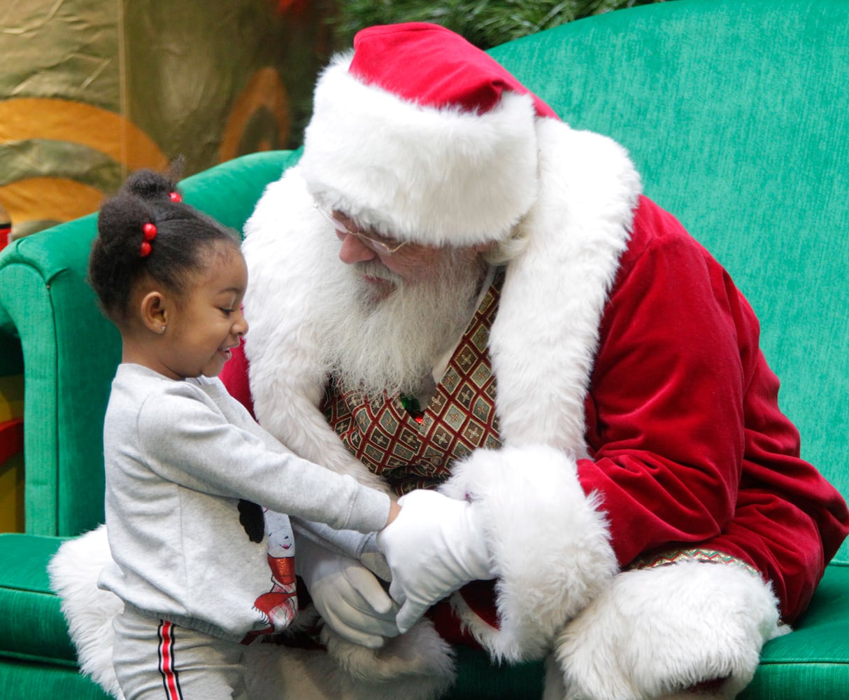 PHOTOS: A visit with Santa Claus makes the holiday season magical