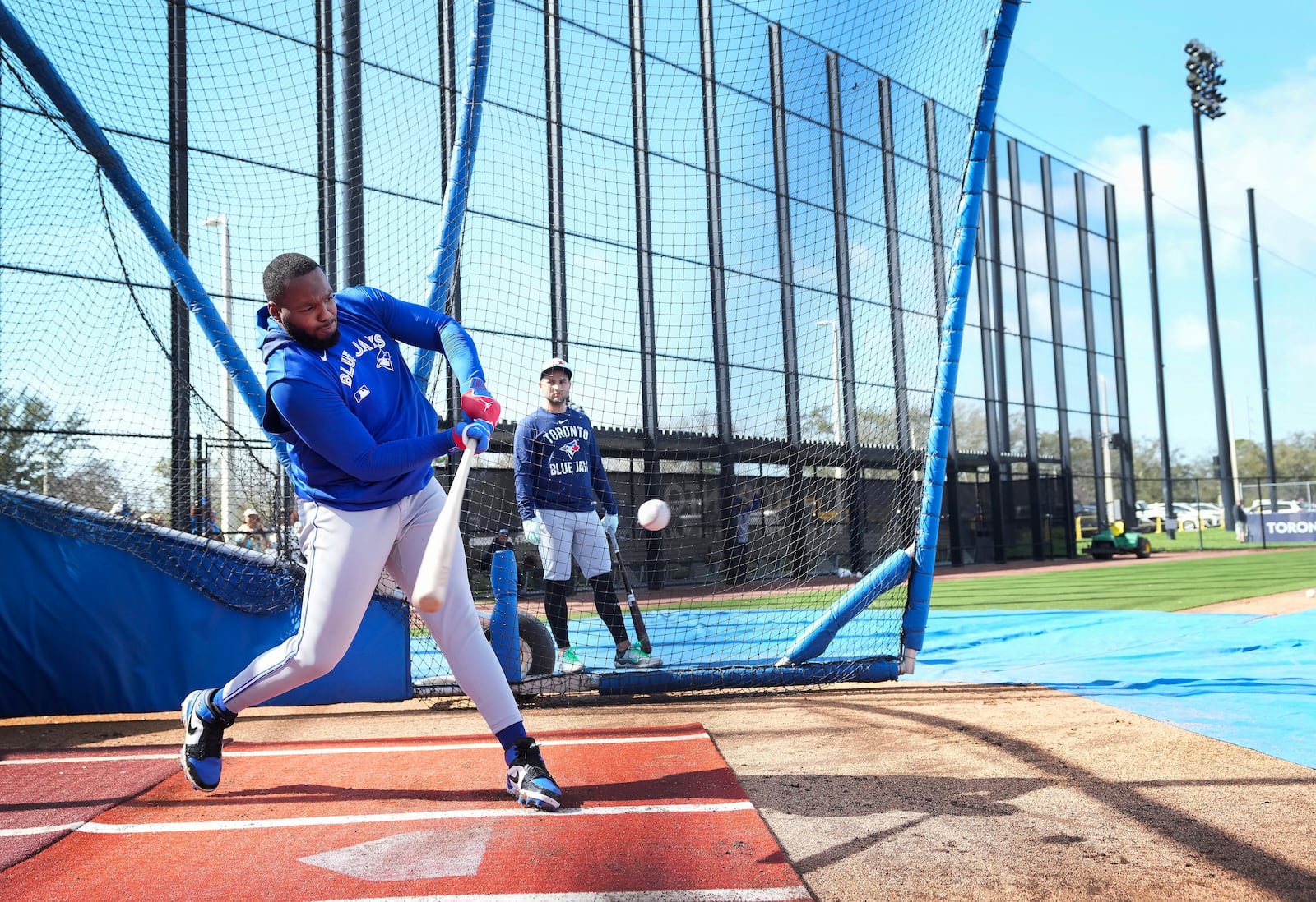 Toronto Blue Jays first baseman Vladimir Guerrero Jr. takes batting practice during spring training baseball workouts in Dunedin Fla., Tuesday, Feb. 18, 2025. (Nathan Denette/The Canadian Press via AP)