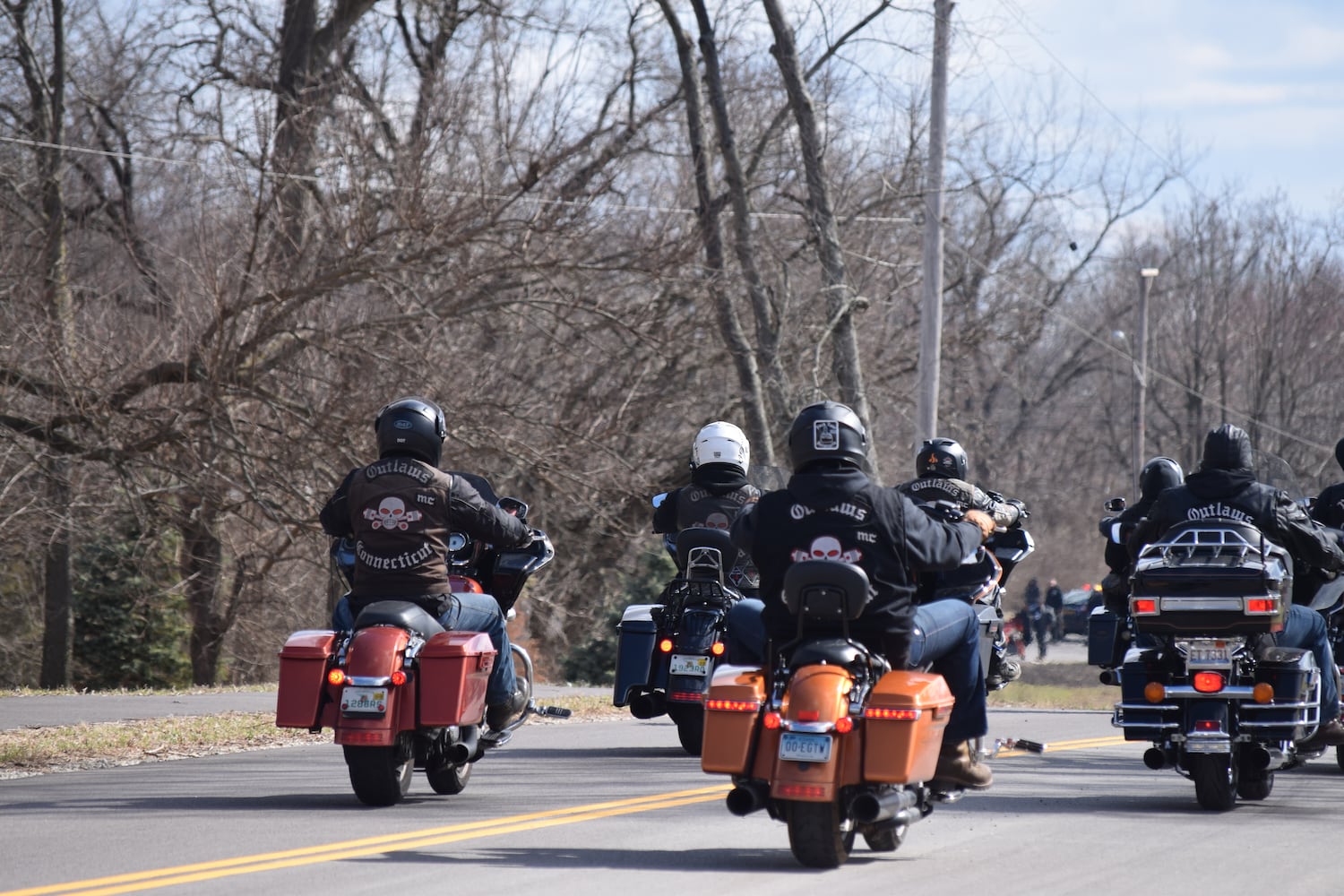 PHOTOS: Thousands of Outlaws attend motorcycle gang leaders funeral at Montgomery County Fairgrounds.