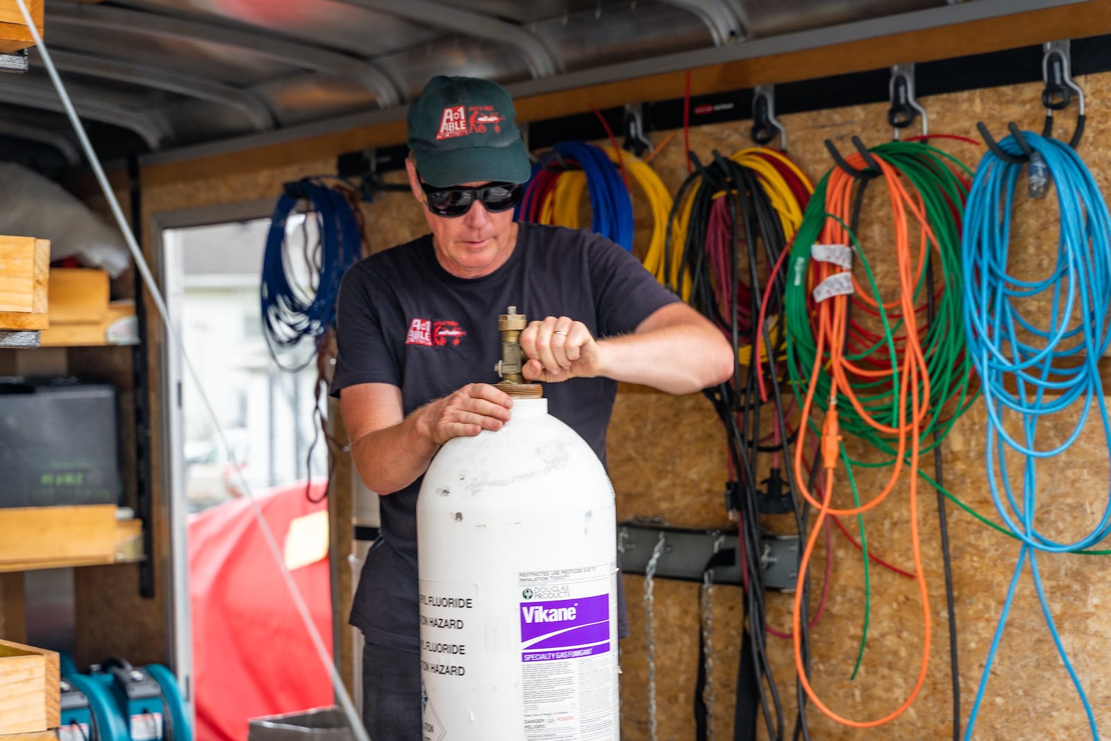 An A-1 Able Pest Doctors worker with a gas fumigant tank. CONTRIBUTED