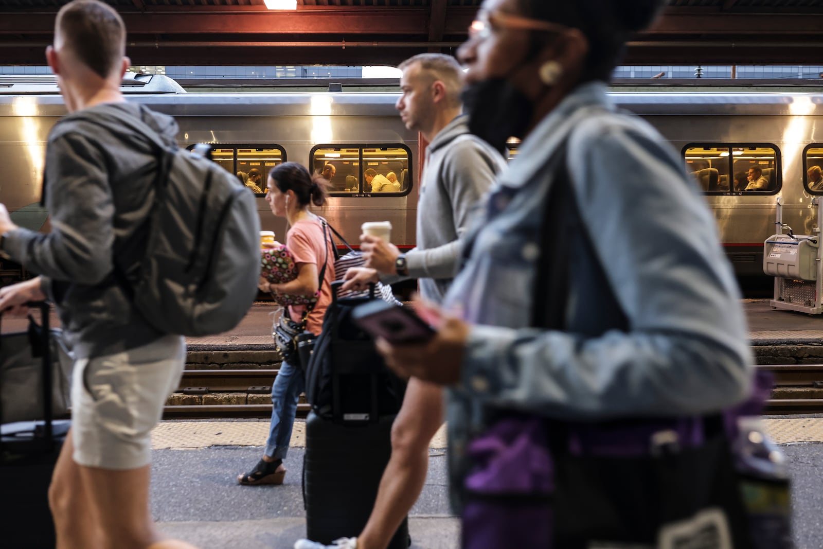 Passengers board an Amtrak train at Union Station in Washington, Sept. 15, 2022. (Oliver Contreras/The New York Times)