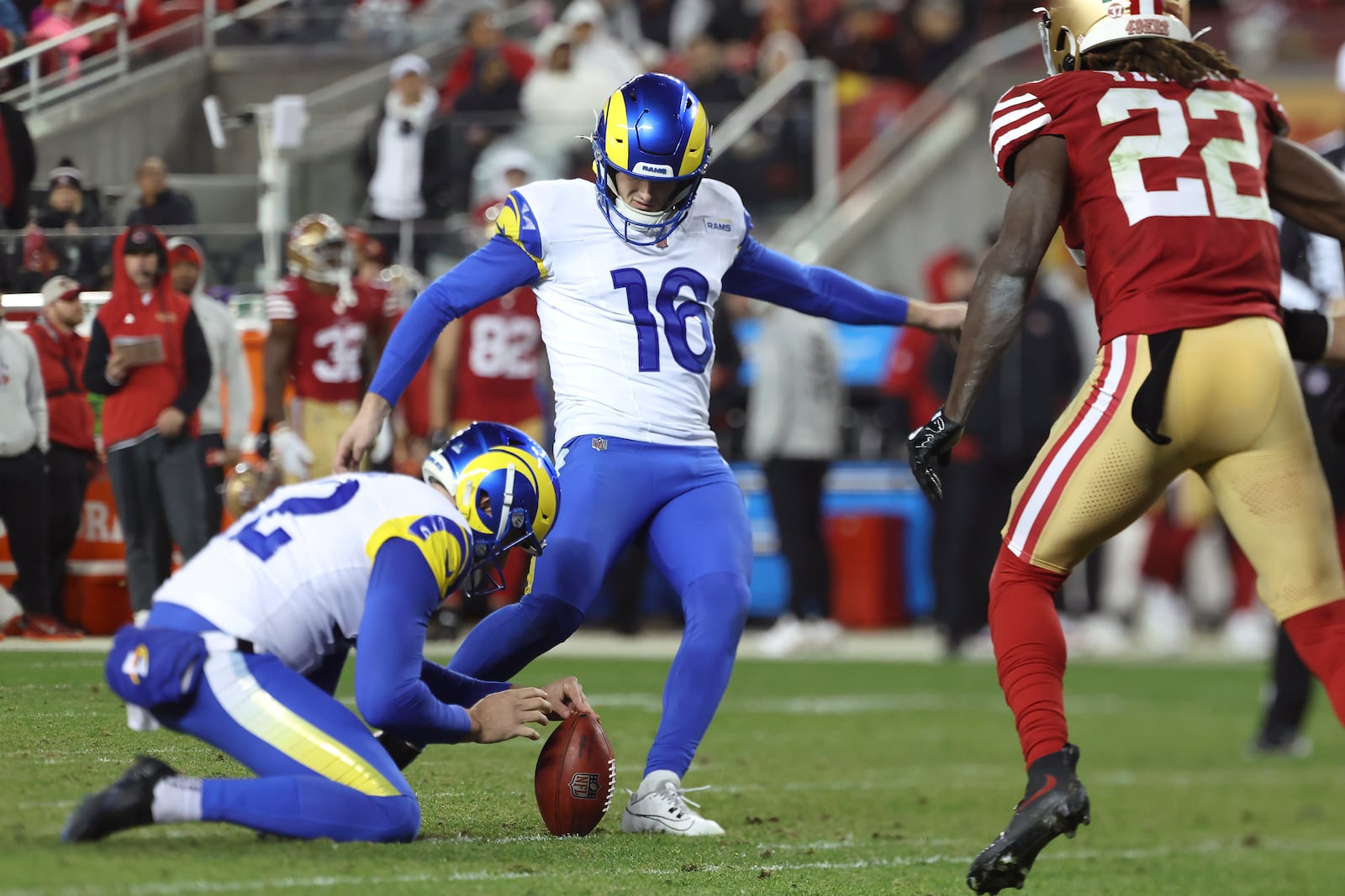 Los Angeles Rams place kicker Joshua Karty (16) kicks a field goal from the hold of Ethan Evans during the second half of an NFL football game against the San Francisco 49ers in Santa Clara, Calif., Thursday, Dec. 12, 2024. (AP Photo/Jed Jacobsohn)