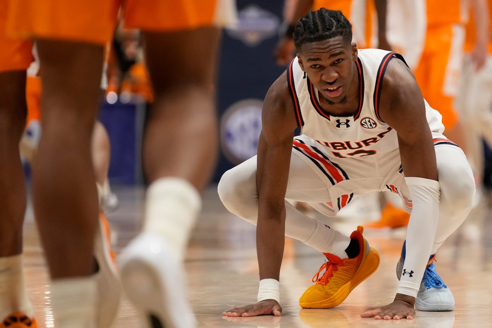 Auburn guard Miles Kelly (13) reacts to a loss against Tennessee after an NCAA college basketball game in the semifinal round of the Southeastern Conference tournament, Saturday, March 15, 2025, in Nashville, Tenn. (AP Photo/George Walker IV)