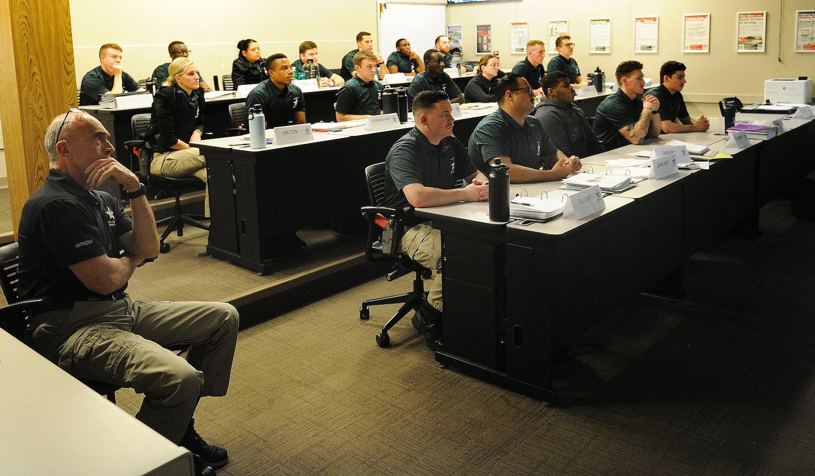 Sinclair police cadets have classroom training Wednesday, Feb. 28, 2024 on how to respond to domestic violence calls. MARSHALL GORBY\STAFF